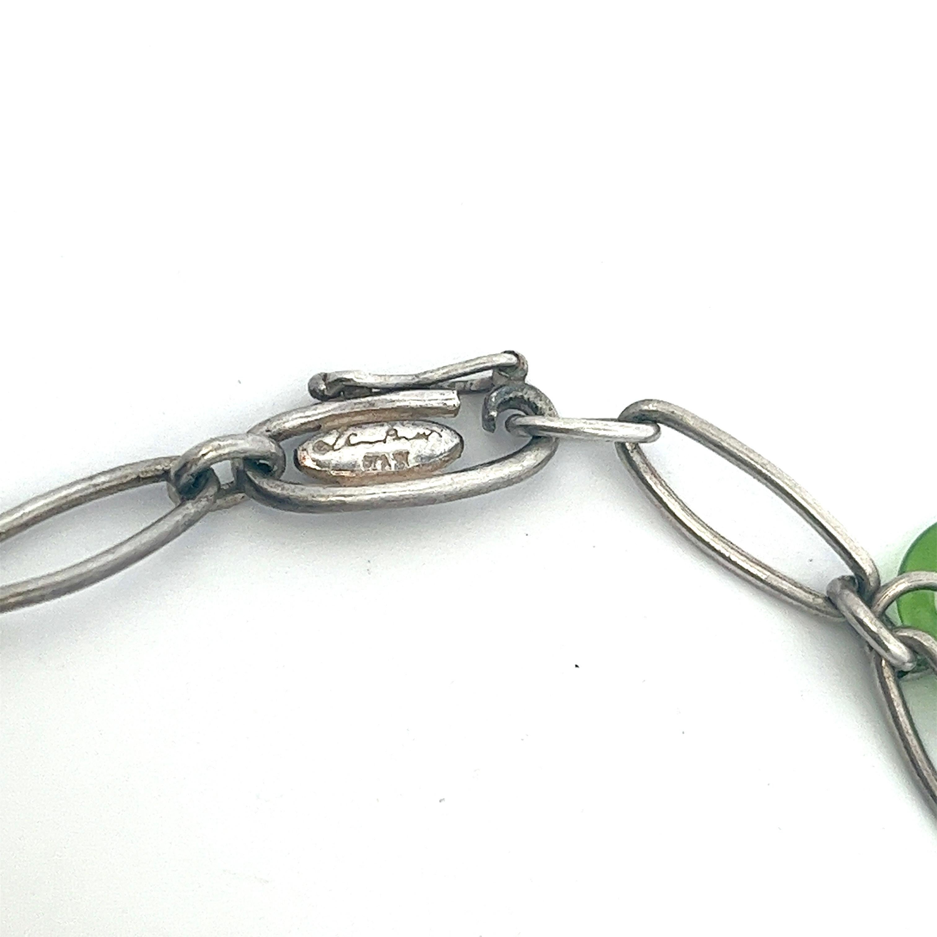 Vintage Elsa Peretti for Tiffany & Co. Five-Charm Bracelet, Sterling Silver 925 In Good Condition In Fairfield, CT
