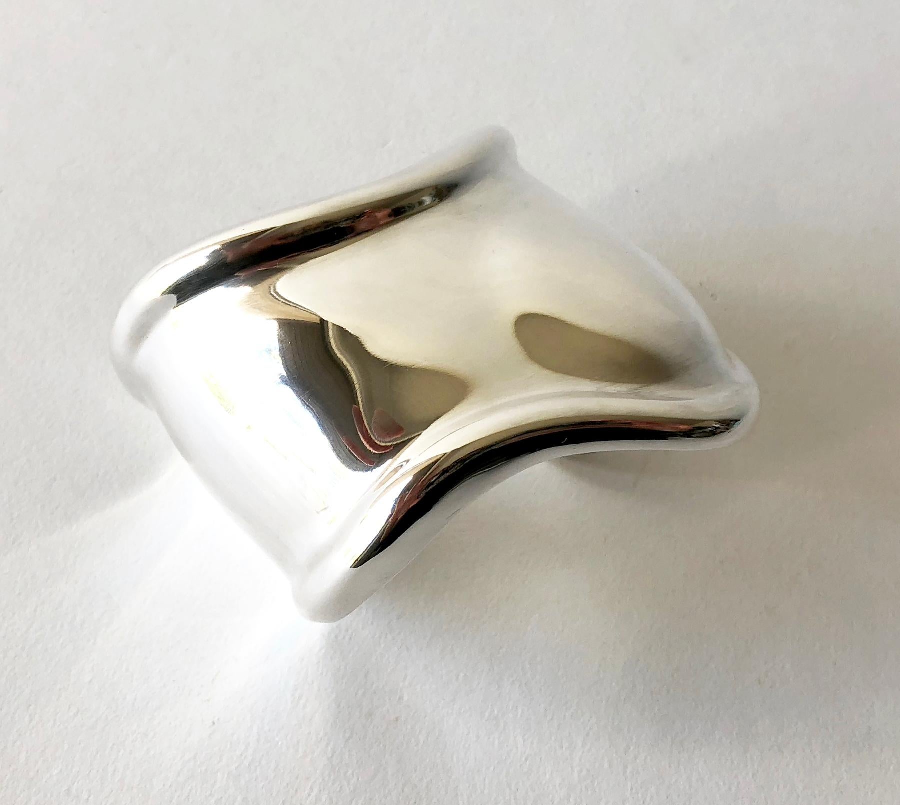 Vintage 1978 sterling silver left wrist bone cuff by Elsa Peretti for Tiffany Co.  Cuff measures 2