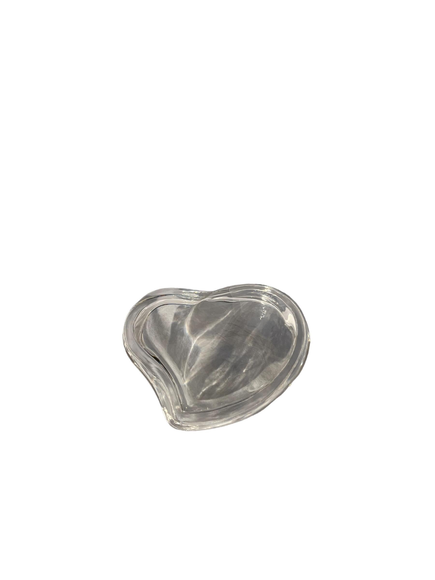 Vintage Elsa Peretti Tiffany Heart Shaped Crystal Box / Jewelry Holder 

Iconic heart shaped crystal jewelry/trinket box designed by Elsa Peretti for Tiffany. Signed & has original Tiffany's sticker.
Excellent condition!

Dimensions:
L 4.5