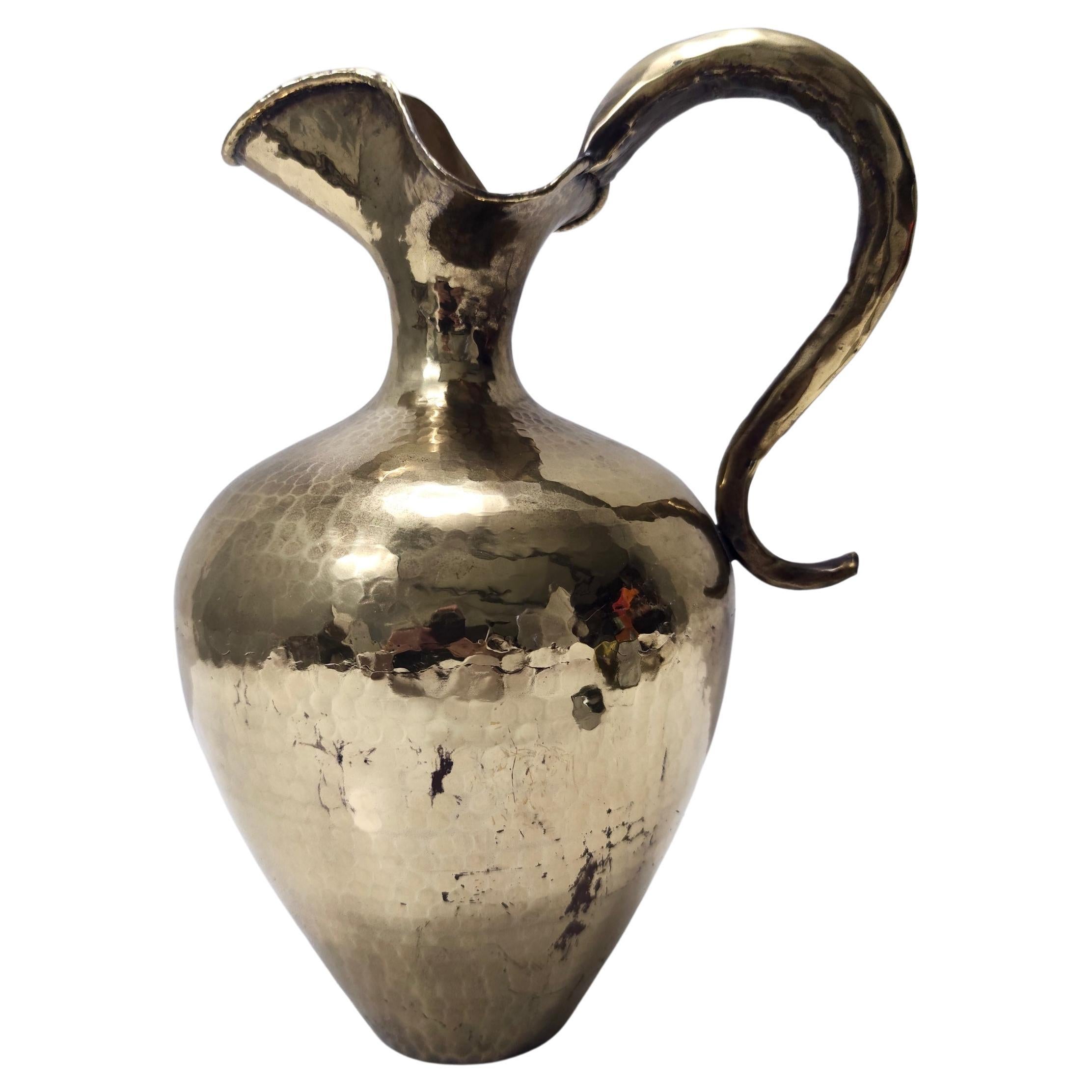 small brass pitcher