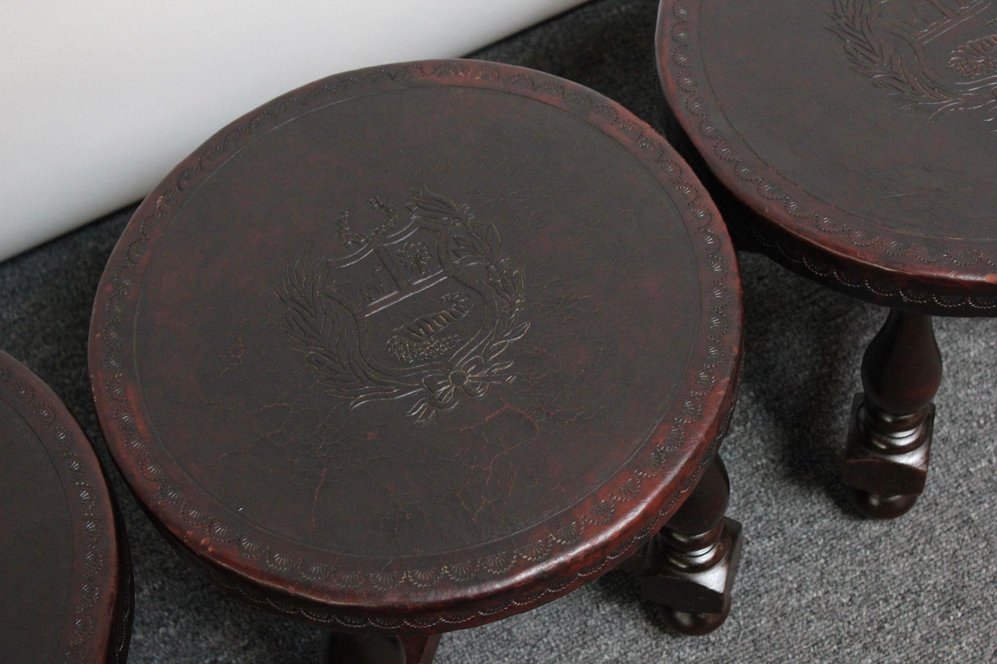 Vintage Embossed Leather Peruvian Coat of Arms Coffee Table and Nesting Stools 9