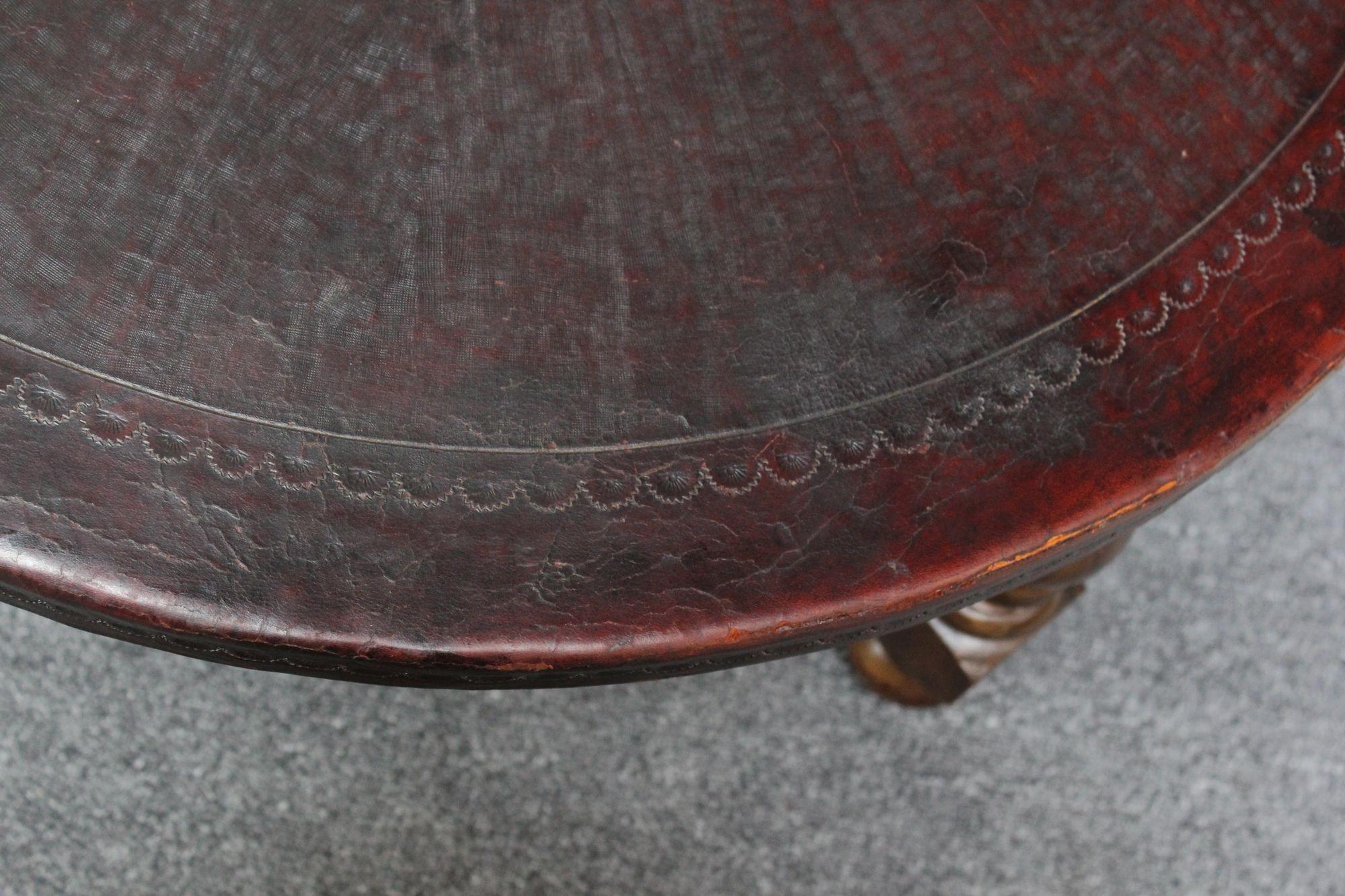 Vintage Embossed Leather Peruvian Coat of Arms Coffee Table and Nesting Stools In Good Condition In Brooklyn, NY