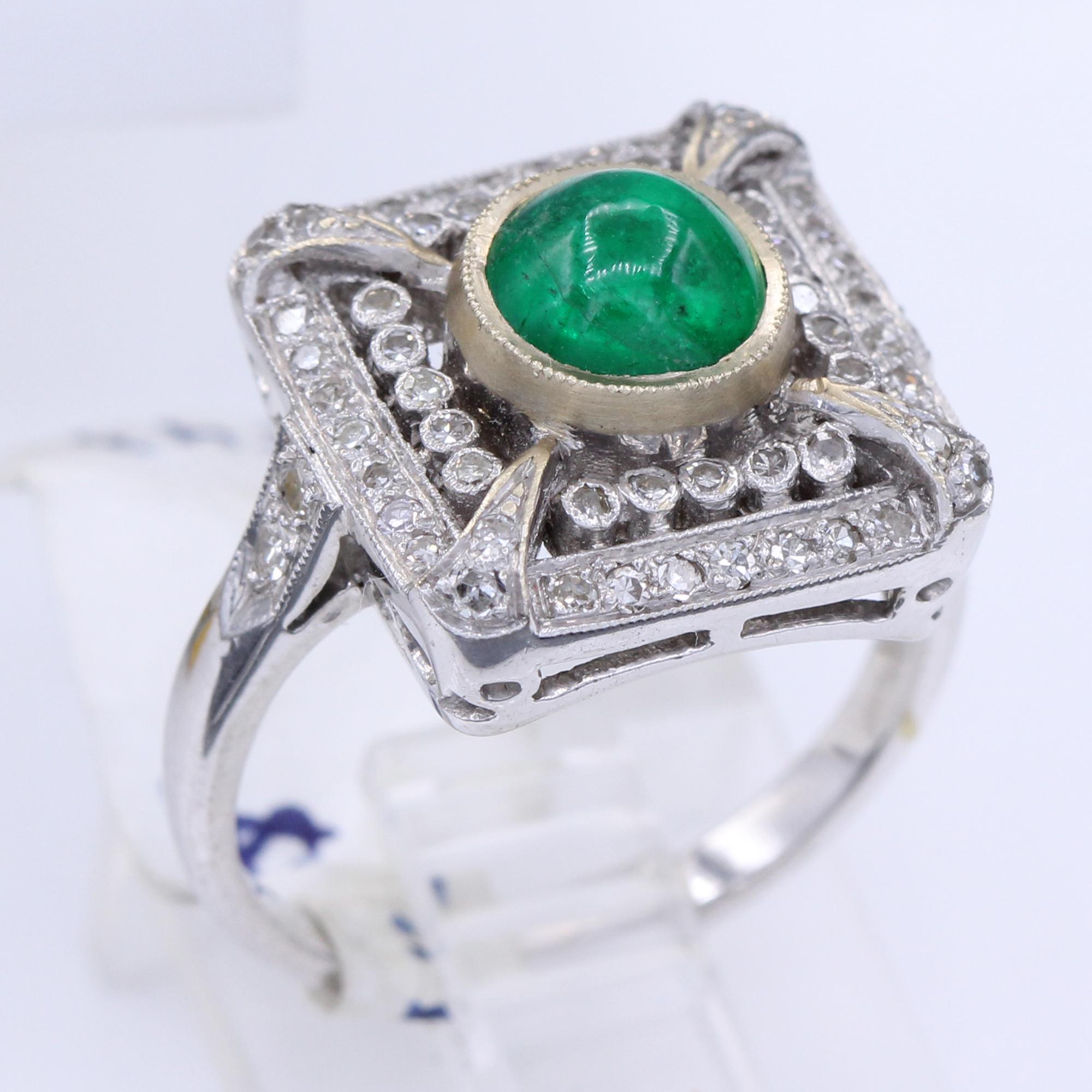 VINTAGE (very good condition)
EMERALD & DIAMOND RING 
18K WHITE GOLD 5.5 GRAMS 
SQUARE DESIGN APPROX  15 X 15 MM 
ALL STONES ARE NATURAL 
DIAMONDS TOTAL APPROX   0.60 CARAT 
EMERALD APPROX APPROX 1.0 CARAT
FINGER SIZE 6.5

