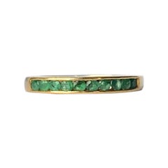 Retro Emerald and 14 Carat Gold Half Eternity Band