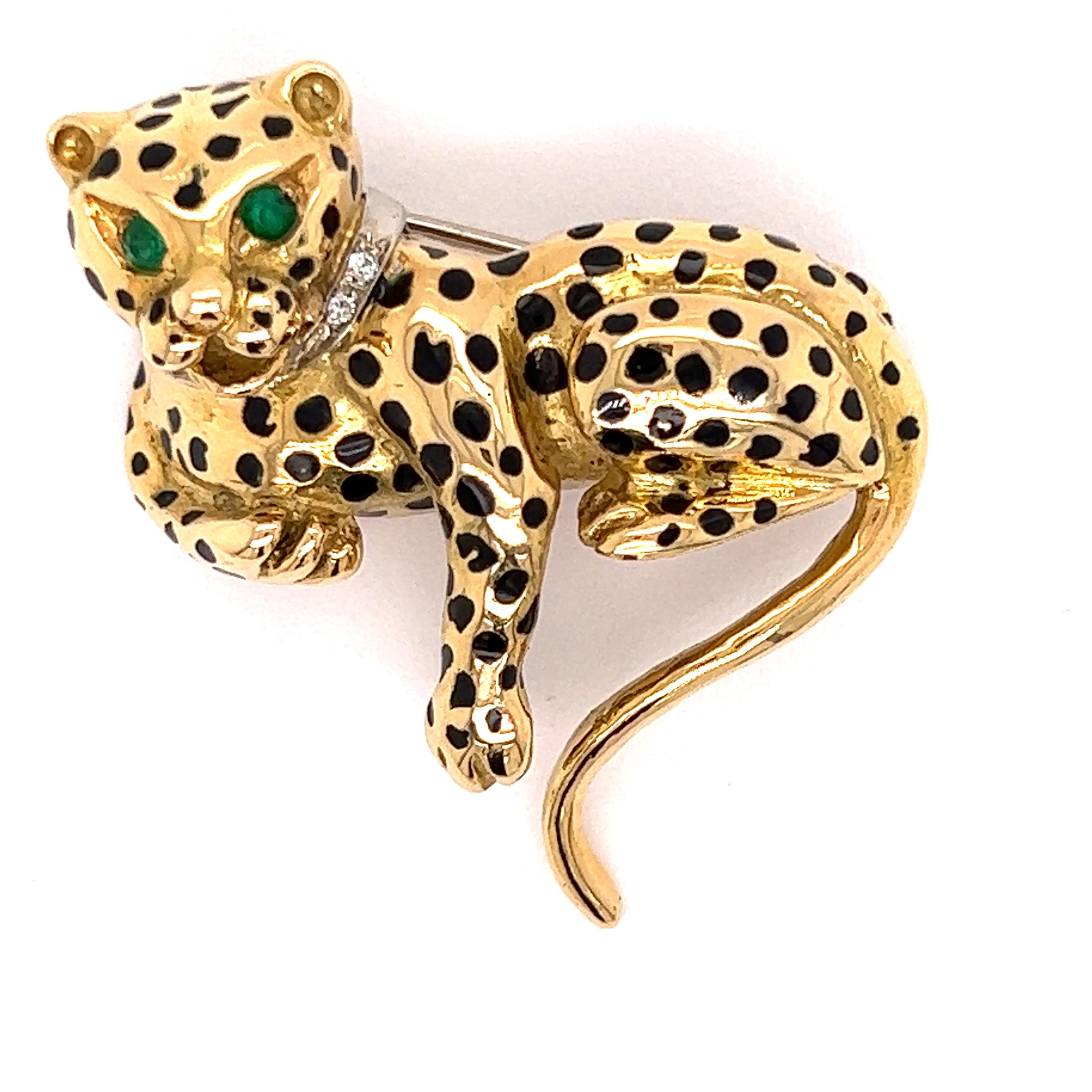 Call it a Panther, Cougar or Leopard, either way it is the absolute purrrfect gift for your cat loving companion.  This substantial estate pin/brooch weighs approximately 22.63 grams of 18Kt yellow gold.  There is .05 cttw in emeralds for the eyes