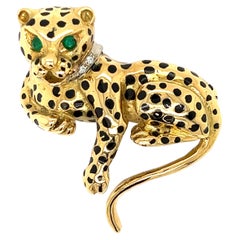 Vintage Emerald and Black Enamel Cougar Brooch in 18Kt Yellow Gold