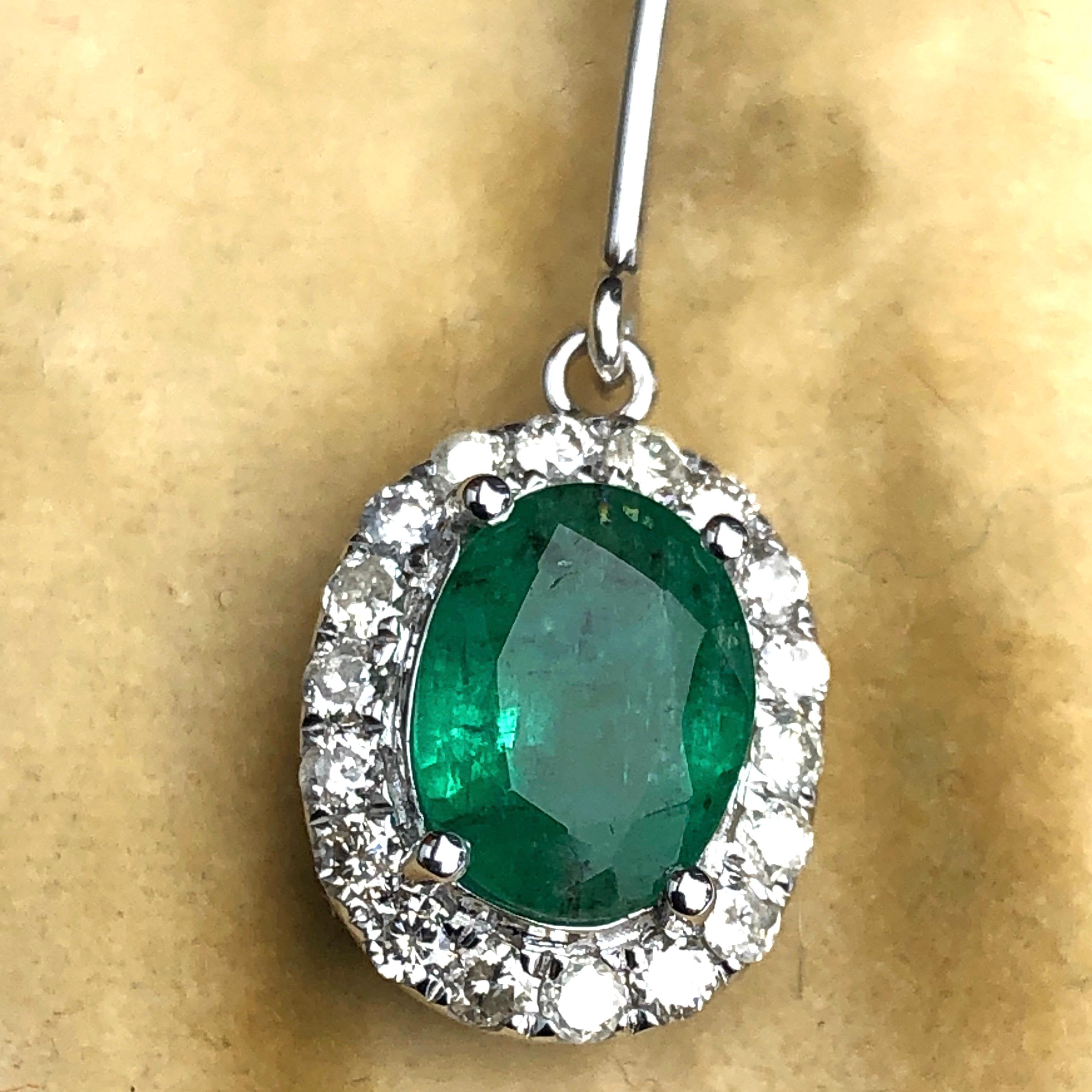 The emeralds at the centre of these fabulous drop earrings are a bright green colour and are gorgeously complimented by a halo of bright sparkling diamonds. The emeralds measure 1.15ct each and the diamonds total 29pts each per earring.

Weight: