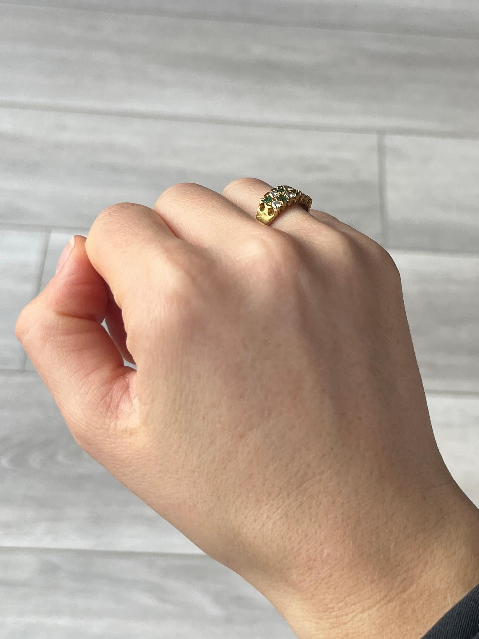 The emeralds in this ring are beautiful and deep green and measure 7pts each. In between the gorgeous green stones are diamonds which measure 7pts each also.  The ring is modelled in 18carat gold. Hallmarked Sheffield 1978.

Ring Size: O 1/2 or 7