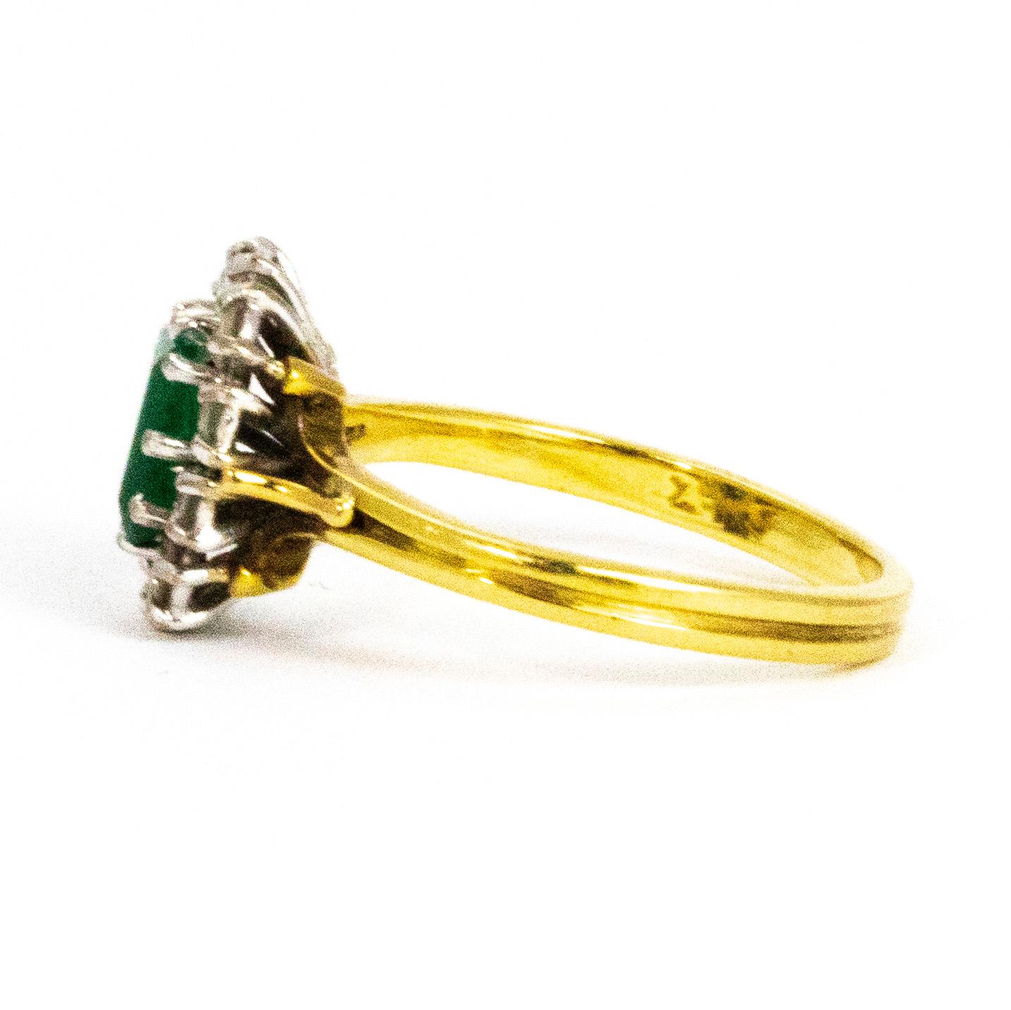 Modern Vintage Emerald and Diamond 18 Carat Gold Cluster Ring