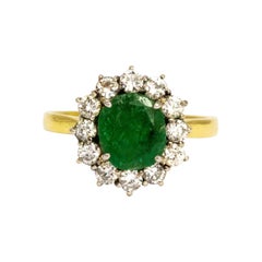 Vintage Emerald and Diamond 18 Carat Gold Cluster Ring Vintage Emerald and Diamond 18 Carat Gold Cluster Ring
