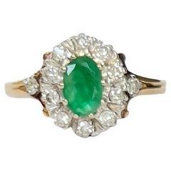 Retro Emerald and Diamond 18 Carat Gold Cluster Ring
