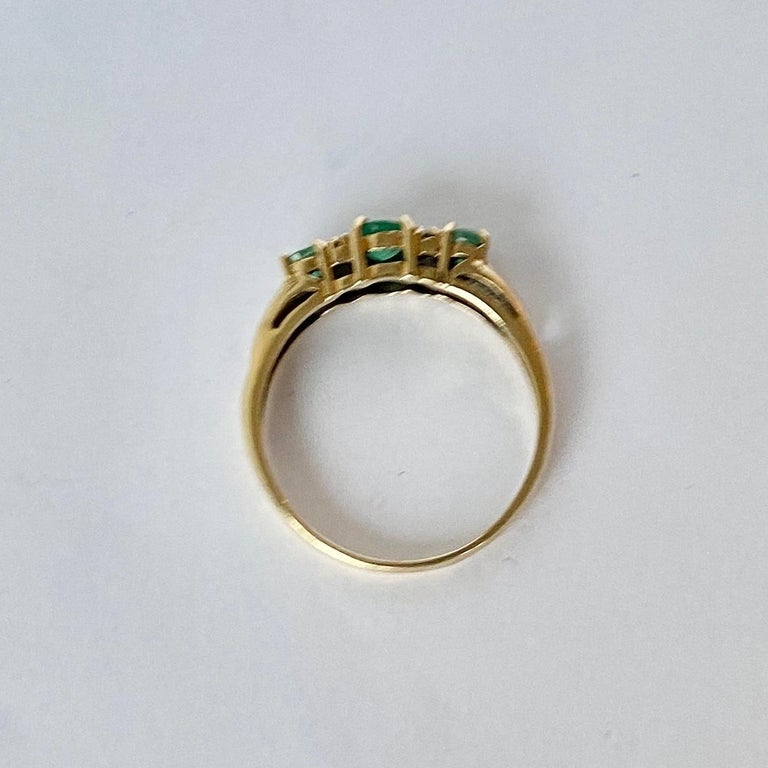 Modern Vintage Emerald and Diamond 9 Carat Gold Three-Stone For Sale