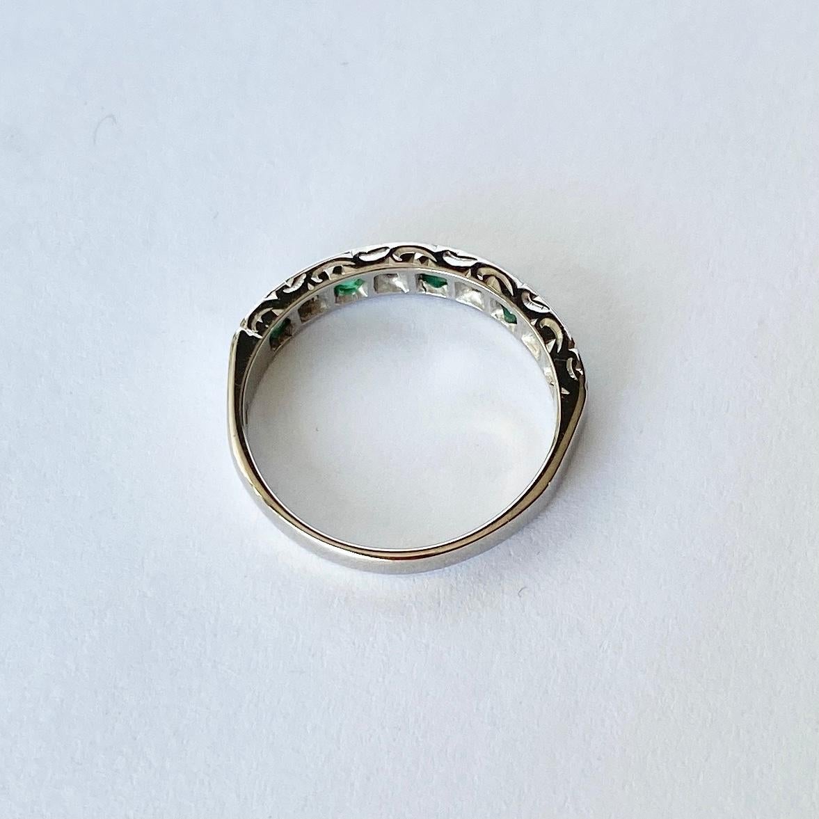 Modern Vintage Emerald and Diamond 9 Carat White Gold Half Eternity Band For Sale