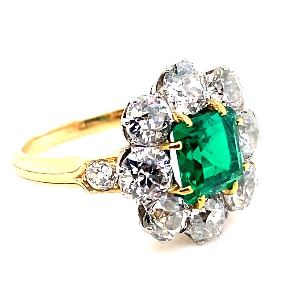 Retro Vintage Emerald and Diamond Cluster 18 Karat Yellow Gold Engagement Ring For Sale