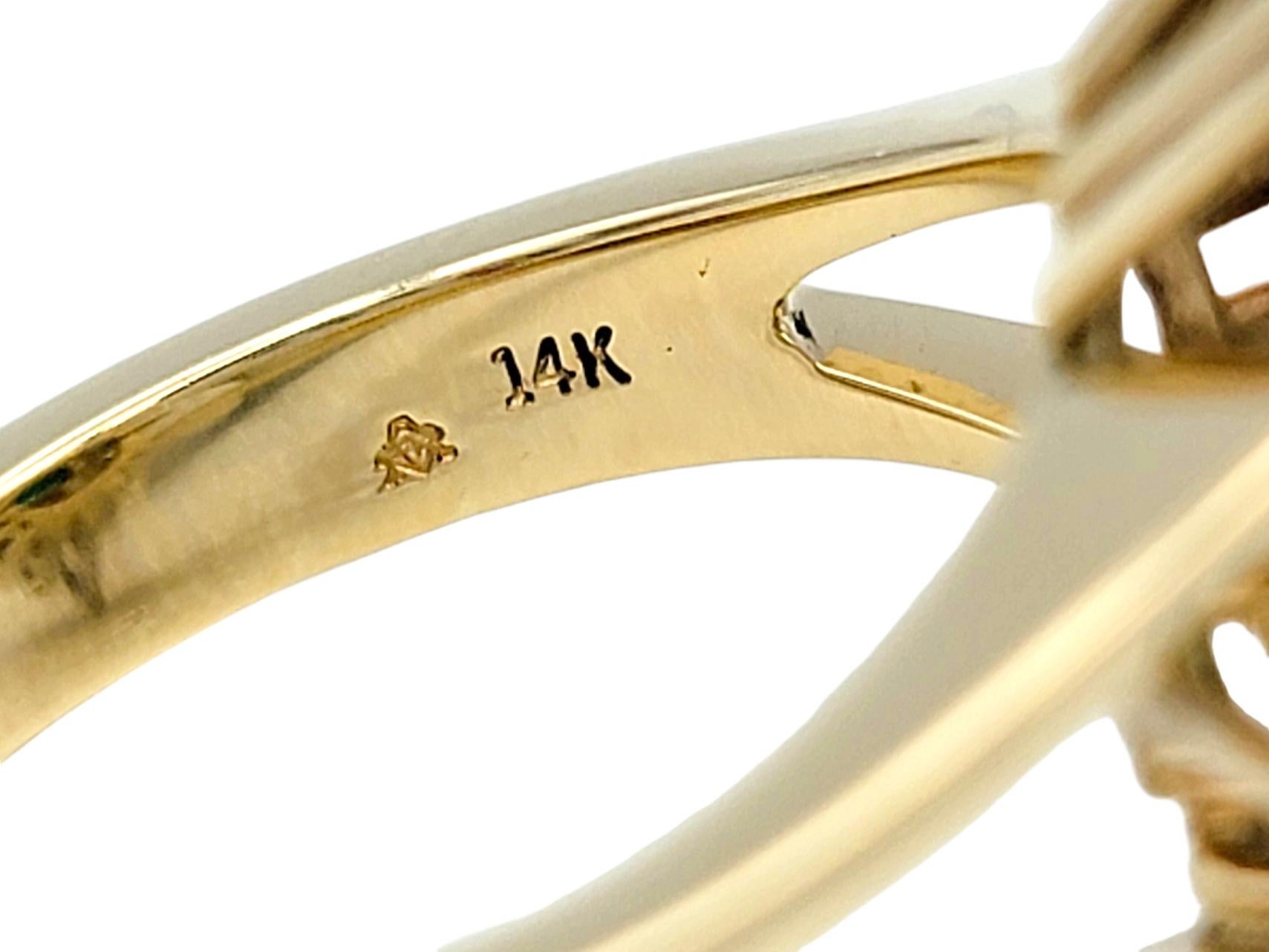 Vintage Emerald and Diamond Cluster Split Shank Cocktail Ring in 14 Karat Gold For Sale 1