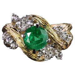 Vintage emerald and diamond cocktail ring