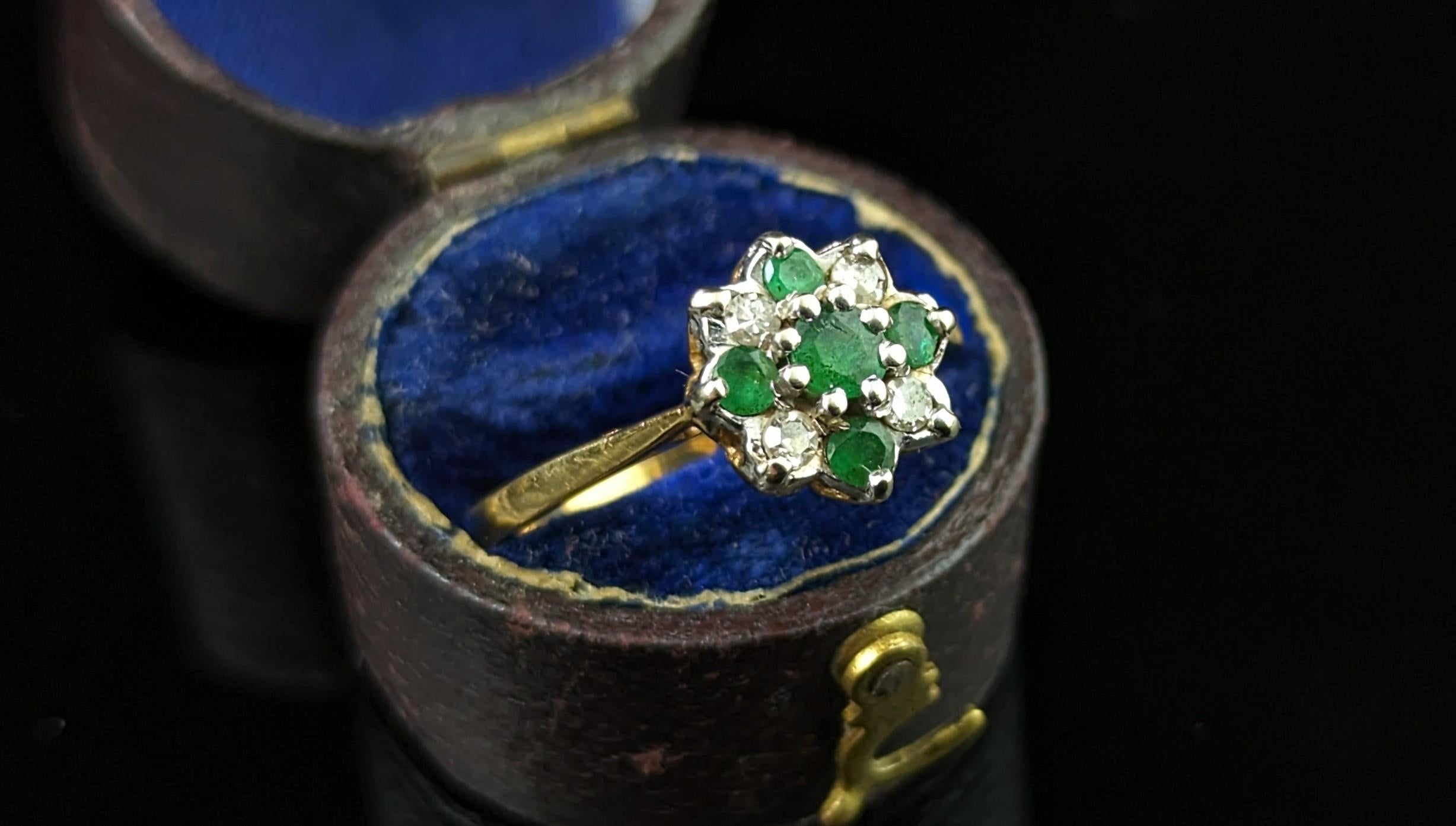 The sweetest vintage Art Deco era Emerald and Diamond cluster ring.

This pretty ring is such a joyful piece of jewellery, crafted in rich buttery 18ct yellow gold the face is set with five round cut emeralds intercepted by four white diamonds and