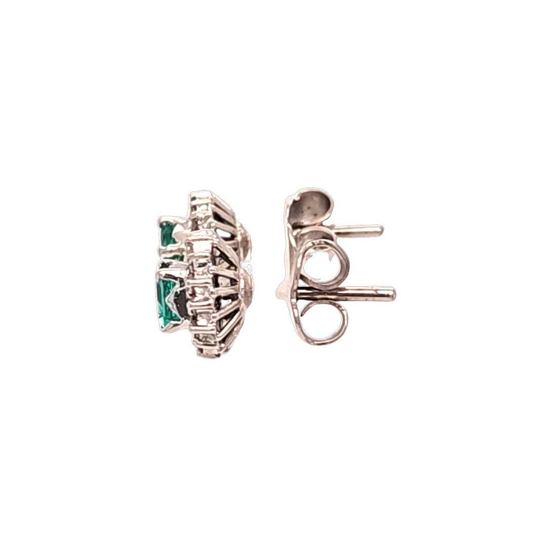 Emerald Cut Vintage Emerald and Diamond Halo Stud Earrings For Sale