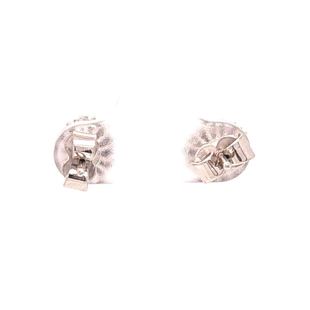 Vintage Emerald and Diamond Halo Stud Earrings In Good Condition For Sale In Coral Gables, FL