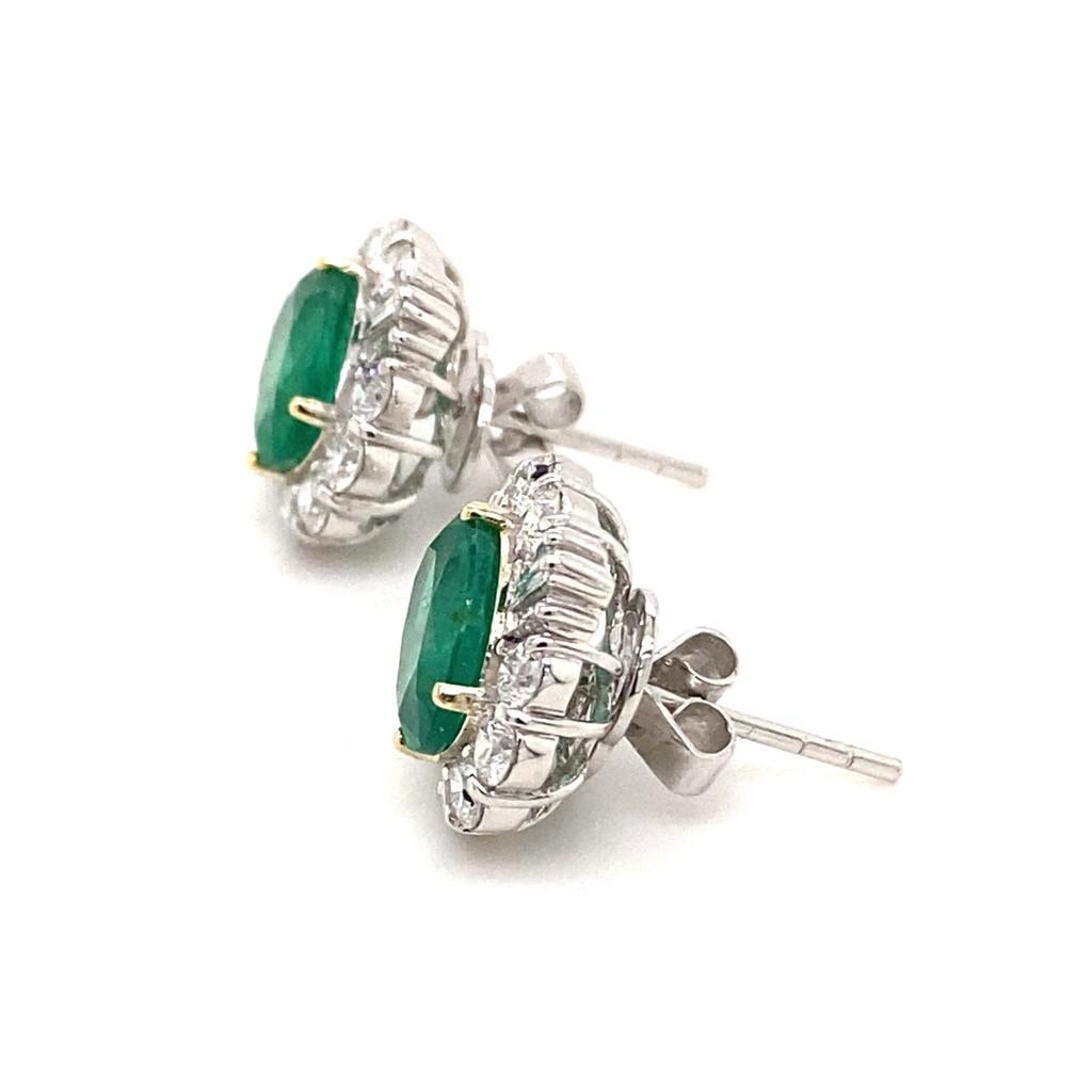 Retro Vintage Emerald and Diamond Platinum Cluster Earrings, Circa 1980 For Sale
