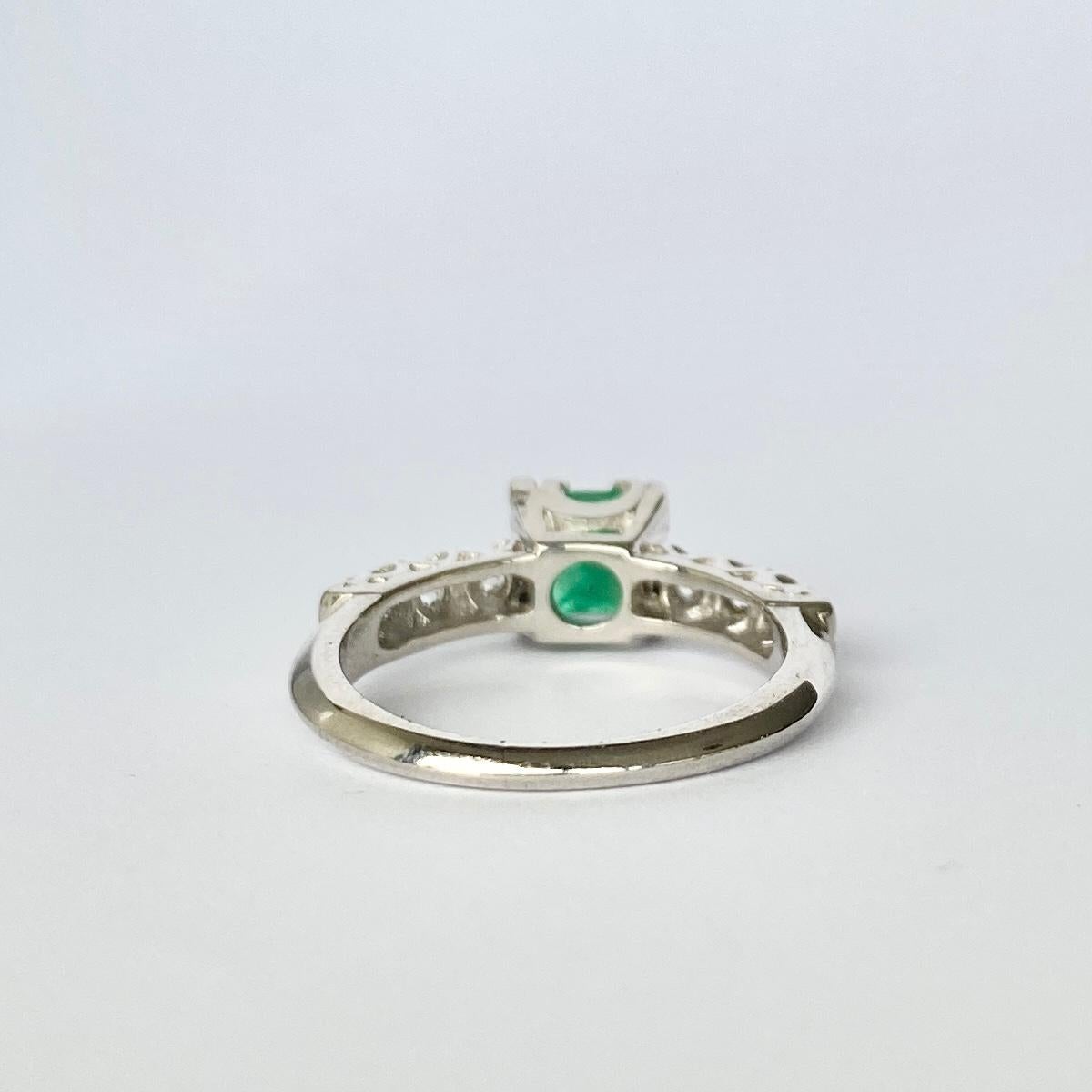 Modern Vintage Emerald and Diamond Platinum Solitaire Ring