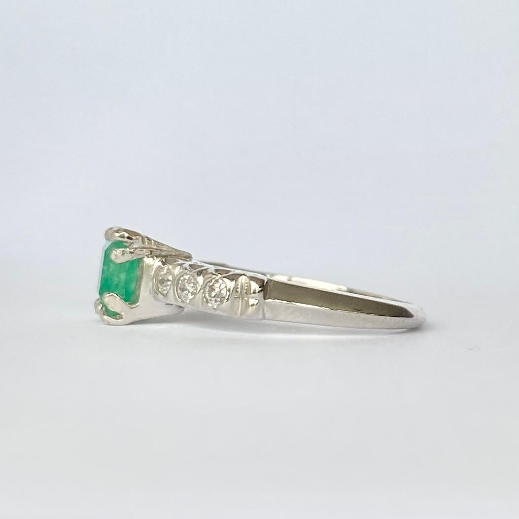 Round Cut Vintage Emerald and Diamond Platinum Solitaire Ring