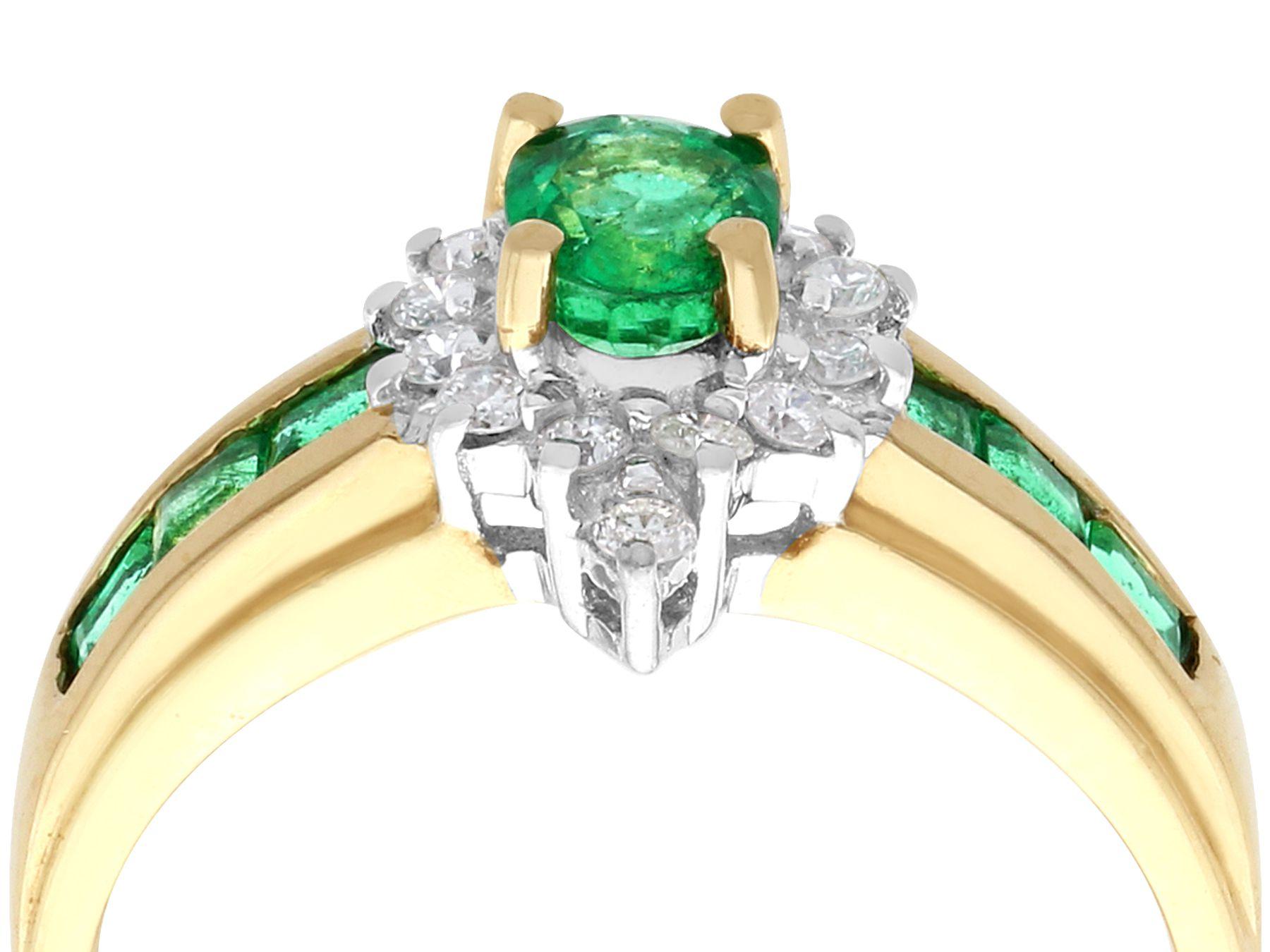 A fine and impressive 0.62 carat emerald and 0.14 carat diamond, 14 karat yellow gold and 14 karat white gold set cocktail ring; part of our diverse jewelry and estate jewelry collections.

This fine and impressive oval cut emerald and diamond dress