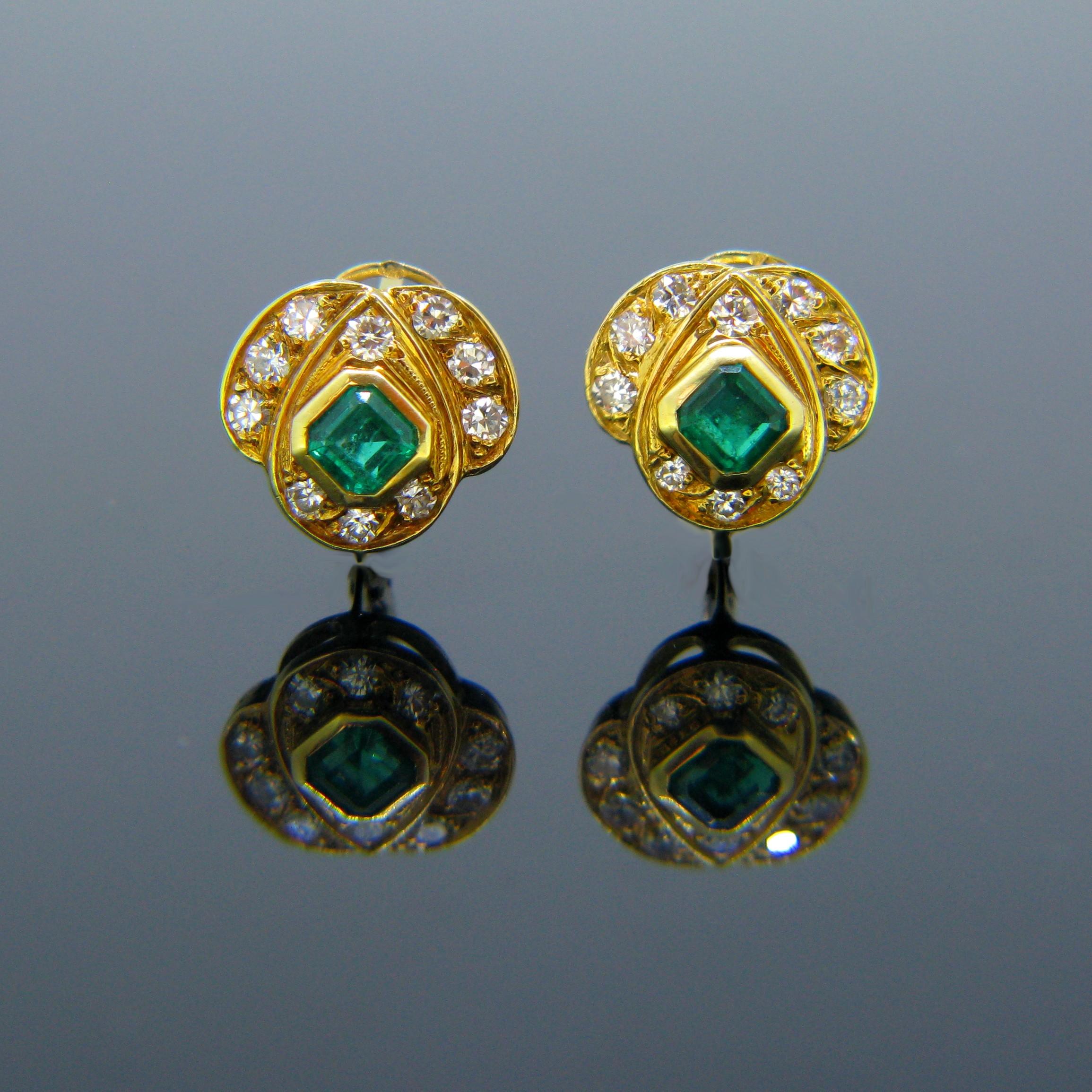 This pretty pair of earrings are set with two vibrant green square step cut emeralds weighing around 0.80ct in total and 20 round brilliant cut diamonds for a total carat weight of around 0.70ct. They are made in 18kt yellow gold. They have a great