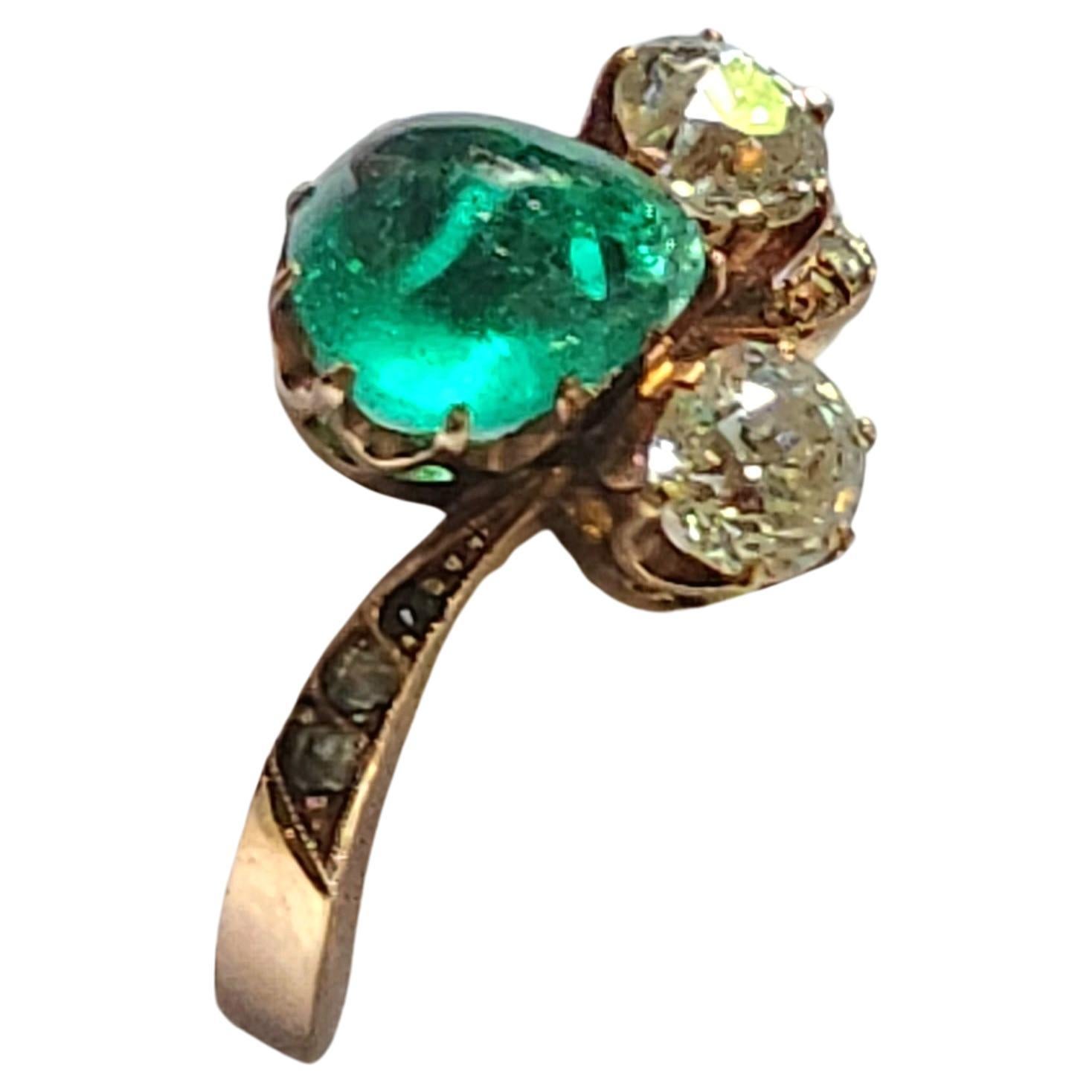 Vintage 14k gold ring centered with cobochon natural green emerald in pear shape cut flanked with 2 old mine cut diamonds estimate 1 carat ring was made during the soviet perioud 1940s/1950s hall marked 583 gold standard and initial maker mark 