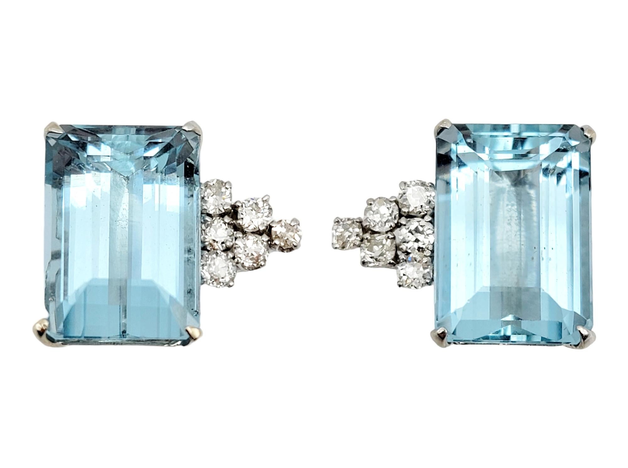 Absolutely stunning vintage diamond and aquamarine earrings. These substantial studs sparkle magnificently on the lobe, shimmering and shining from all angles. 

These gorgeous earrings feature a total of 19.02 carats of incredible emerald cut light