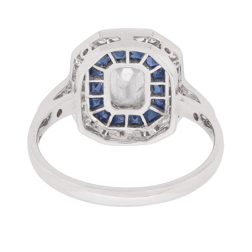 Vintage Emerald Cut Diamond and Sapphire Halo Ring, circa 1950s In Excellent Condition In London, GB