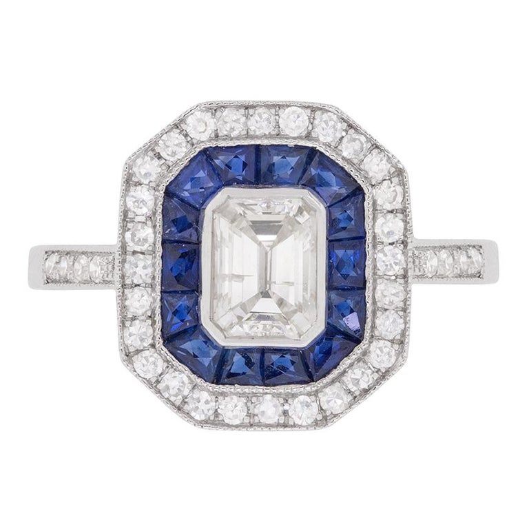 Vintage Emerald Cut Diamond and Sapphire Halo Ring, circa 1950s For