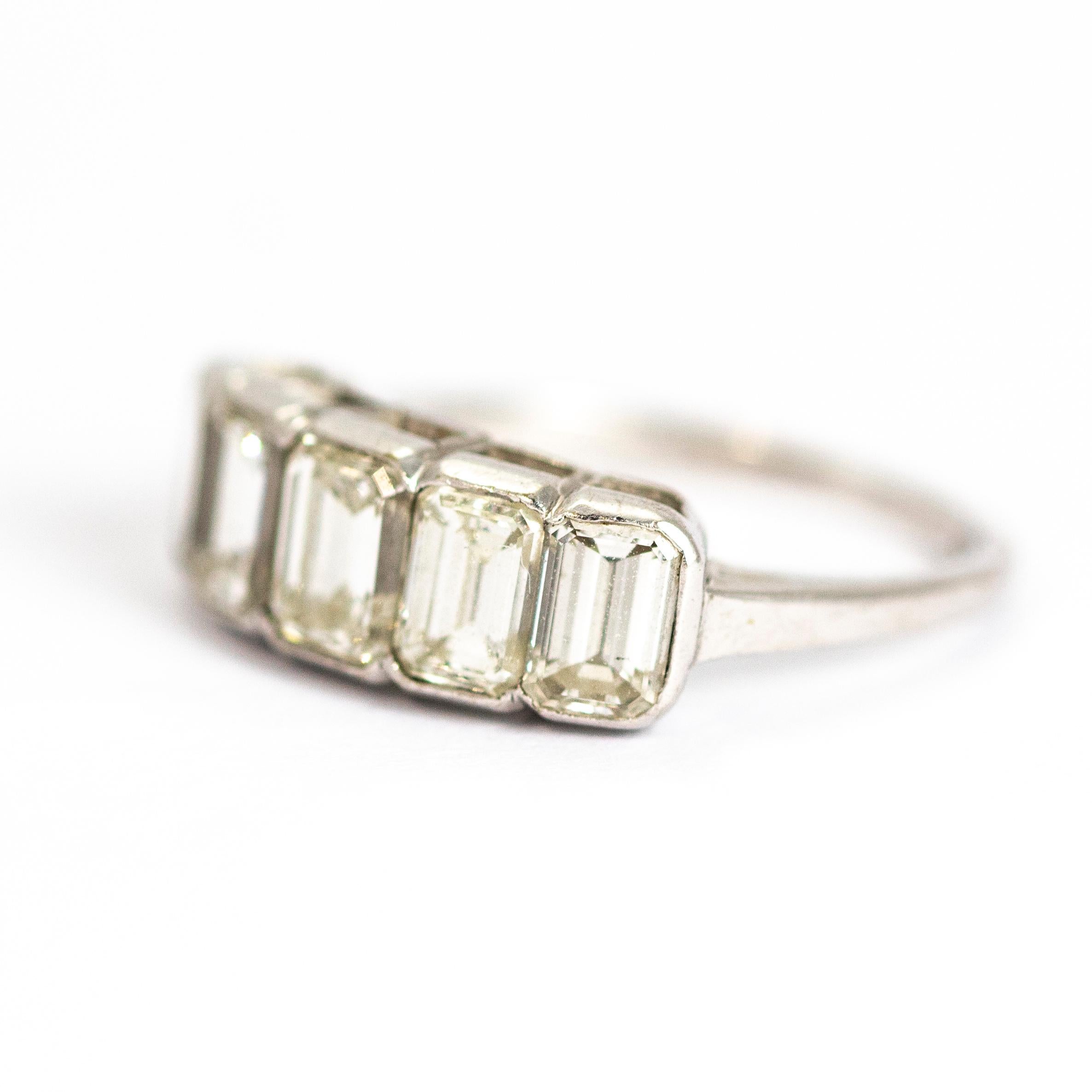The emerald cut diamonds perched on top of this 18ct white gold band are exquisite. The 'hall of mirrors' effect in the stones really is mesmerising. The ring holds five stones in total, the centre stone measuring 50pts, the next stone down in size