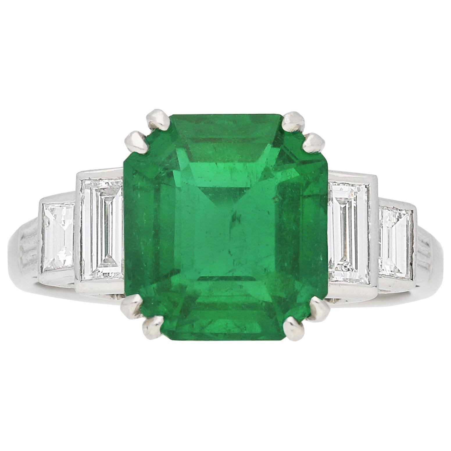 Vintage EmeraldCut Diamond Flanked Solitaire Ring, Set to Centre with