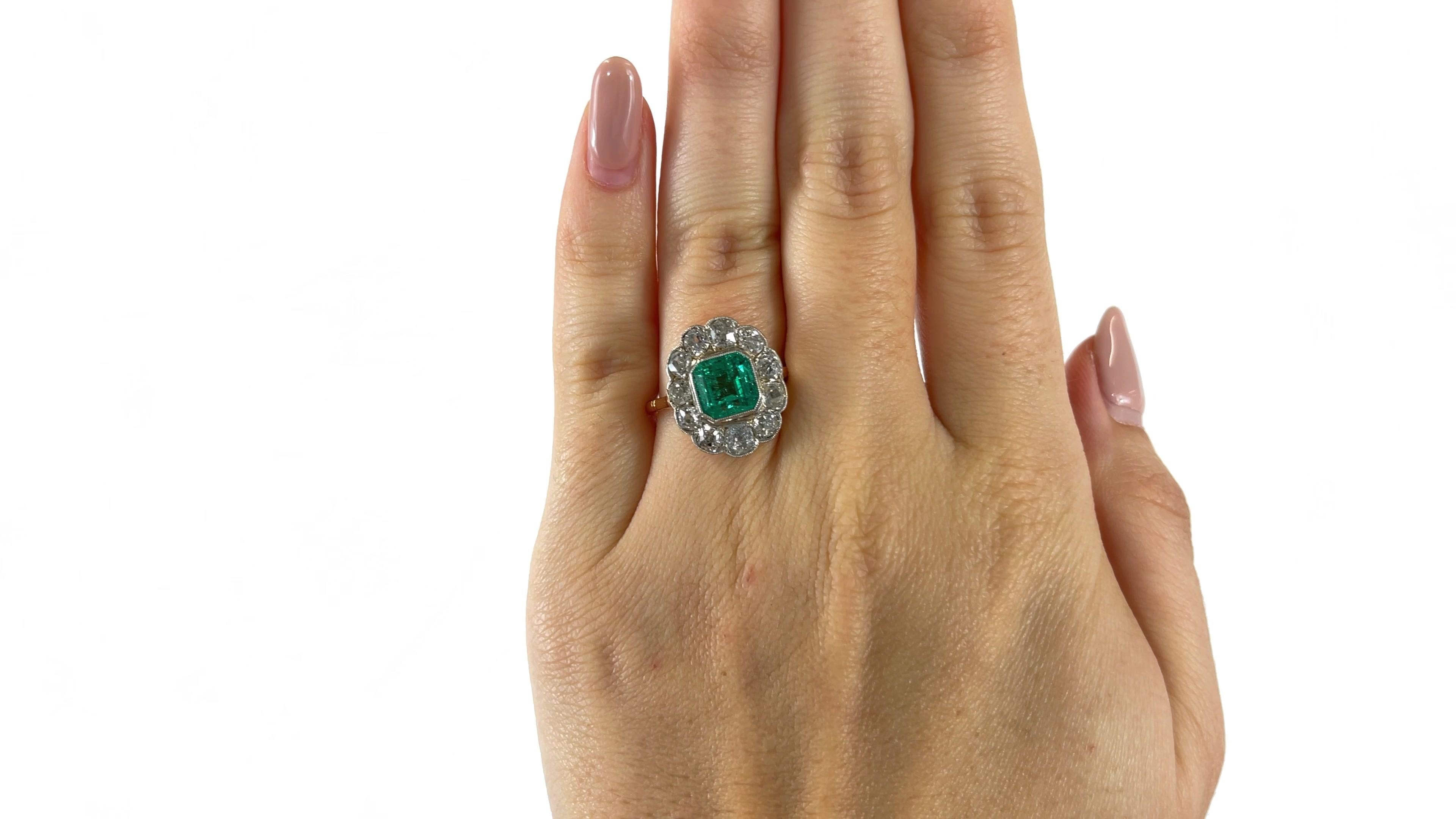 One Vintage Emerald Diamond 18 Karat Gold Ring. Featuring one square emerald weighing approximately 1.90 carat. Accented by 11 old European cut diamonds with a total weight of approximately 2.75 carats, graded I-J color, SI-I clarity. Crafted in 18