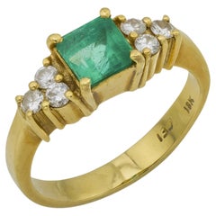 Anello di fidanzamento vintage con smeraldo e diamante in oro giallo 18 carati