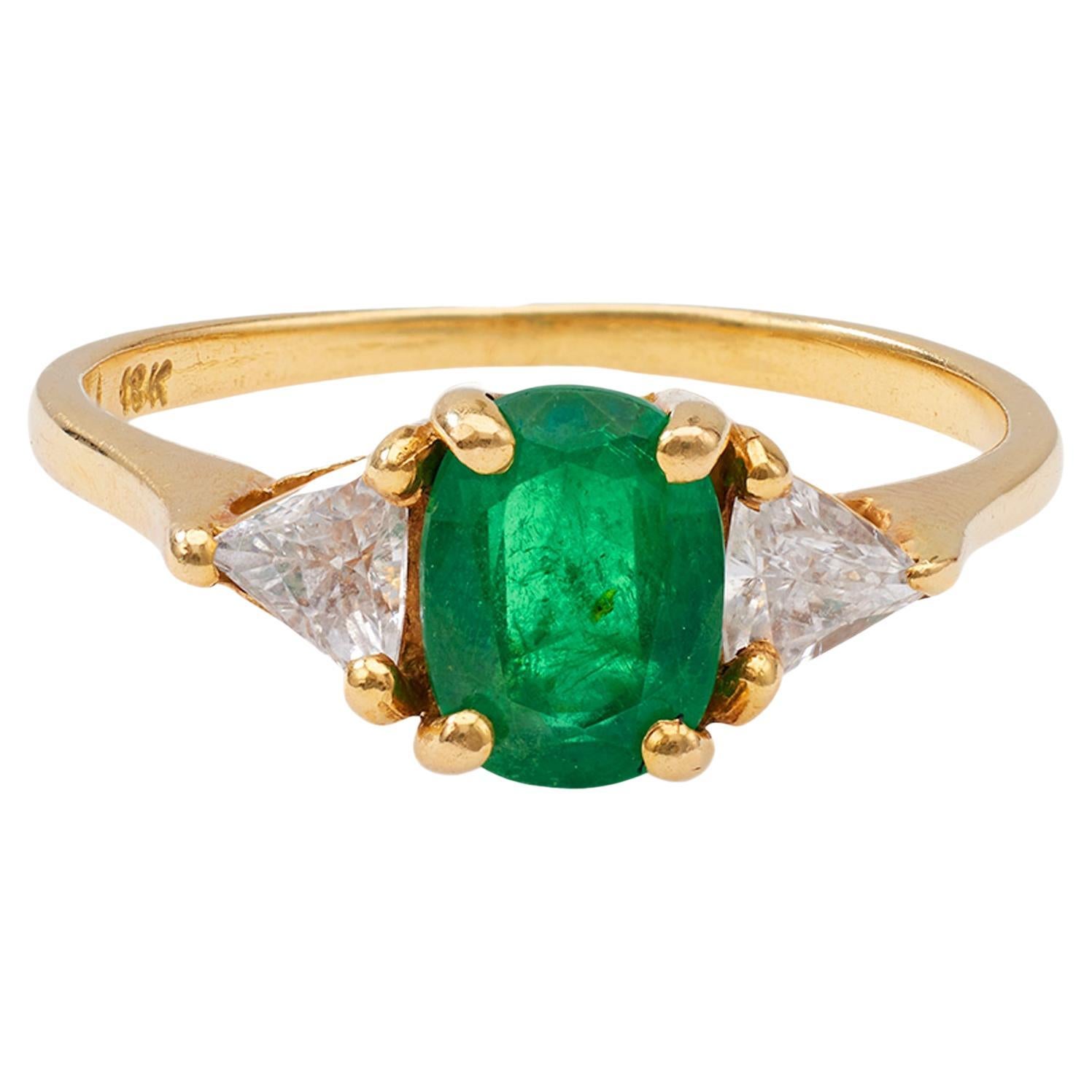 Vintage-Ring aus 18 Karat Gelbgold mit Smaragd und Diamant im Angebot