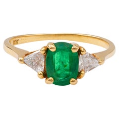 Vintage-Ring aus 18 Karat Gelbgold mit Smaragd und Diamant