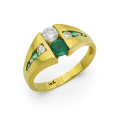 Anello vintage con smeraldo e diamante in oro giallo 18 carati
