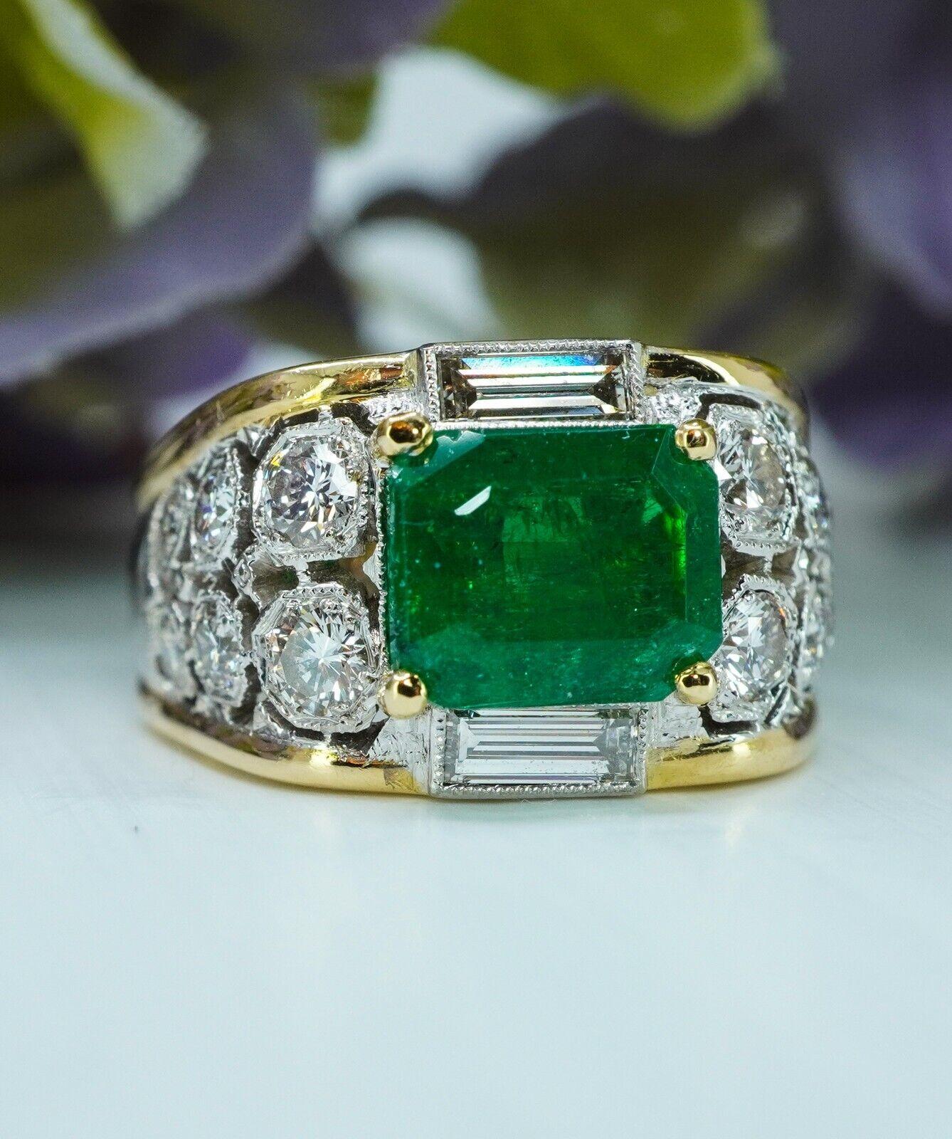 GIA Vintage Emerald Diamond Baguette Ring 18K Gold Designer Size 5 Certified

This is a gorgeous 18K white and yellow gold piece. It is very similar to Buccellati style, but not Buccellati. 
The central genuine earth mined emerald measures 7.82mm x