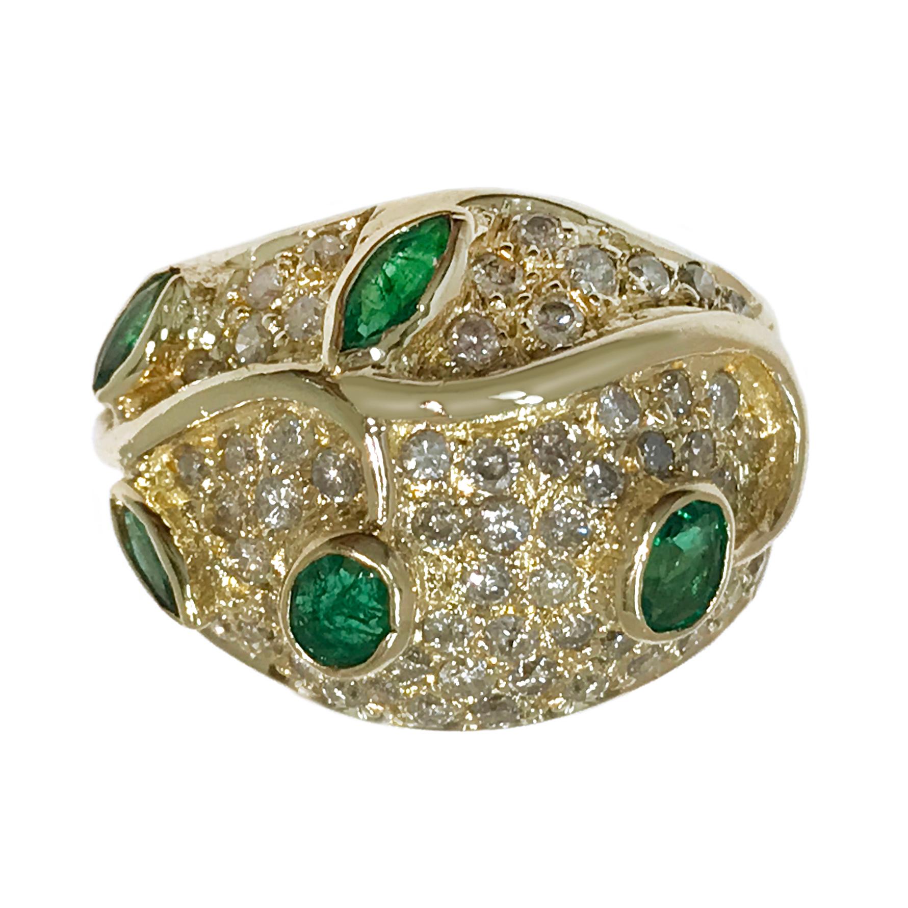 Vintage Emerald and Diamond 14 Karat Yellow Gold Cocktail Ring, Bezel/Pave. A golden vine with Emerald leaves, bezel-set, 0.64 carat adore this ring, the five Emeralds are marquise, oval, and round cut. Seventy-eight (78) pavé set Diamonds (1.56