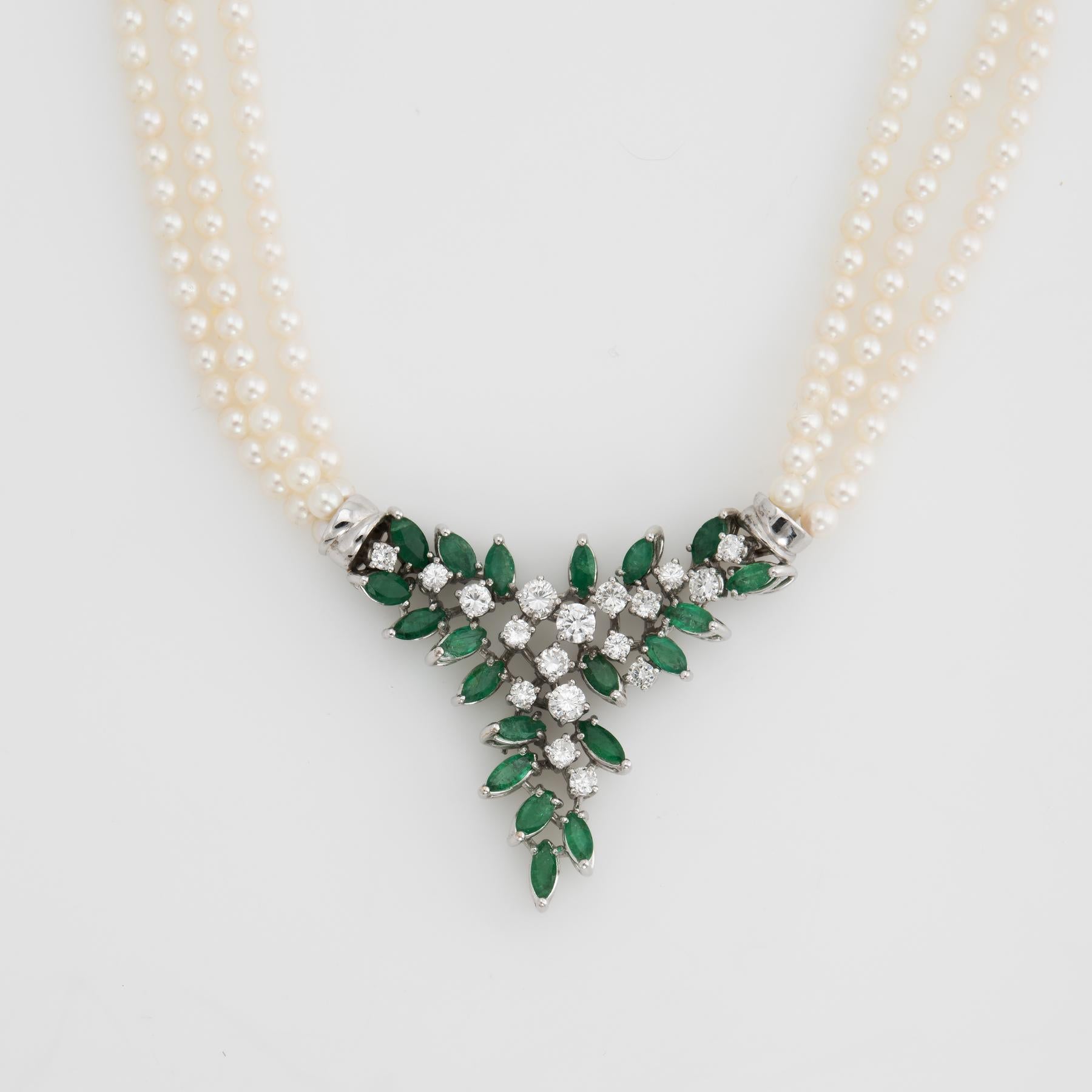 Elegant and finely detailed emerald, diamond & cultured pearl necklace, crafted in 18 karat white gold.  

Round brilliant cut diamonds graduate ion size from 0.03 to 0.105 carats. The total diamond weight is estimated at 1.19 carats (estimated at