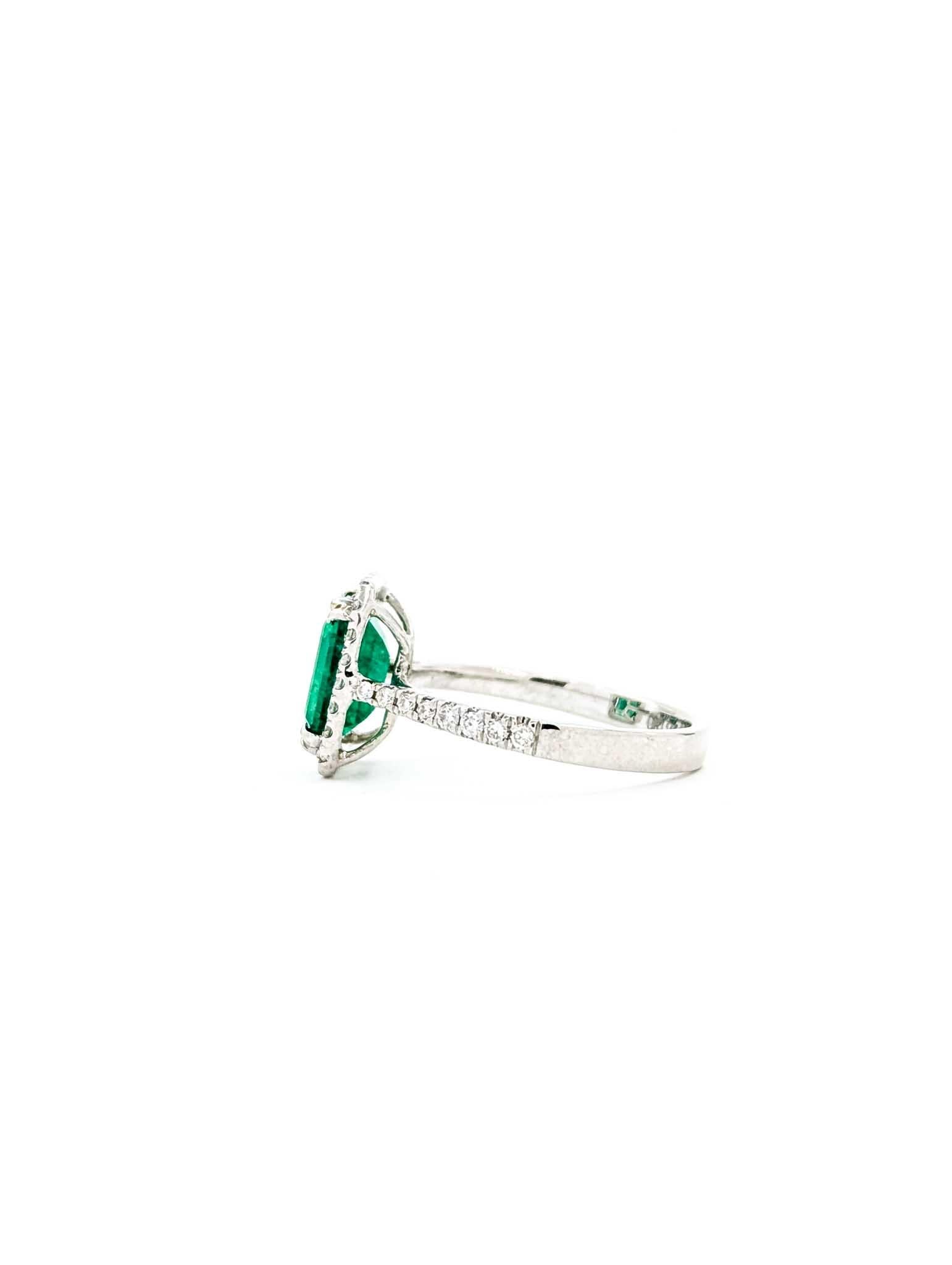 Contemporary Vintage Emerald Diamond Halo Ring in 14k White Gold For Sale