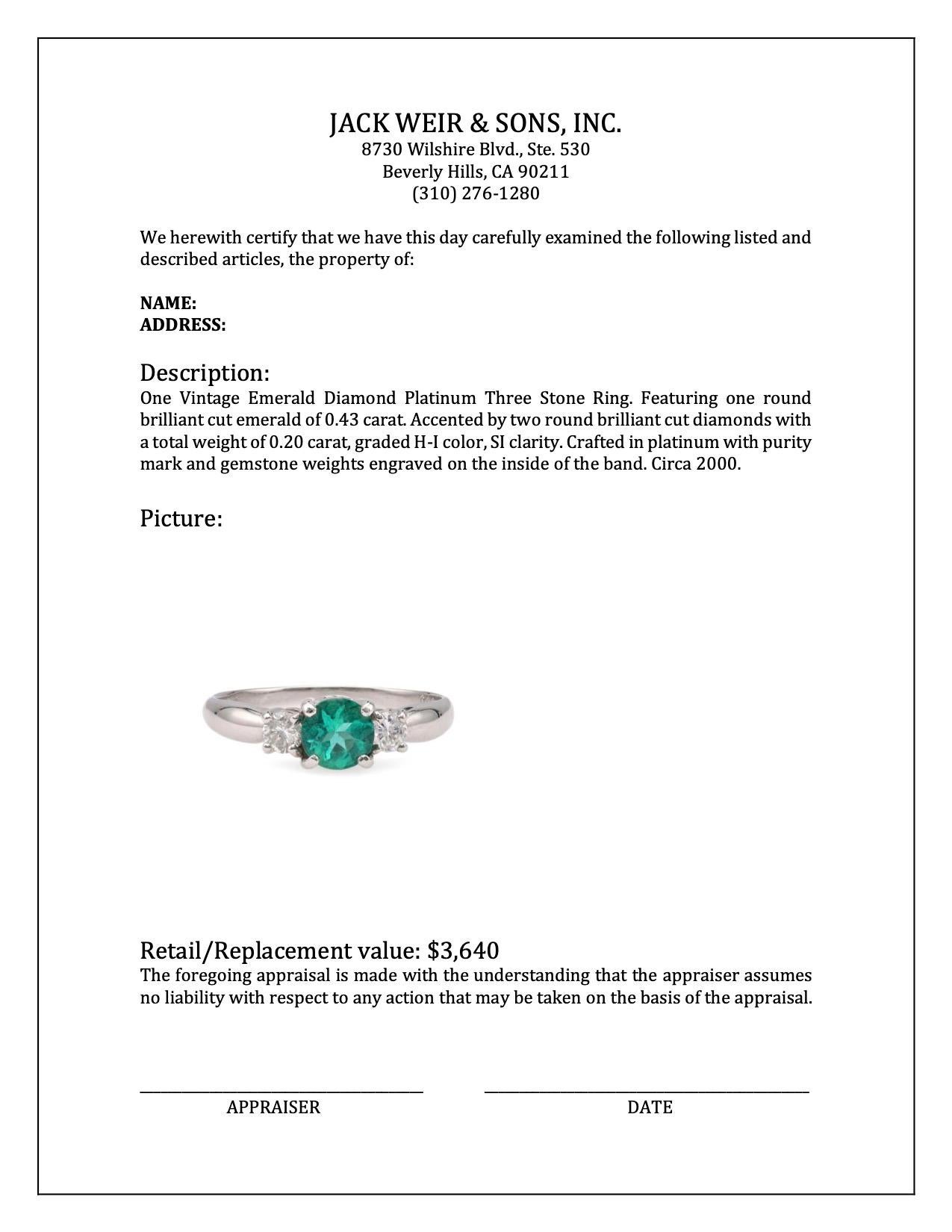 Vintage Emerald Diamond Platinum Three Stone Ring For Sale 1