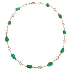 Chaîne collier vintage en or avec diamants et émeraudes