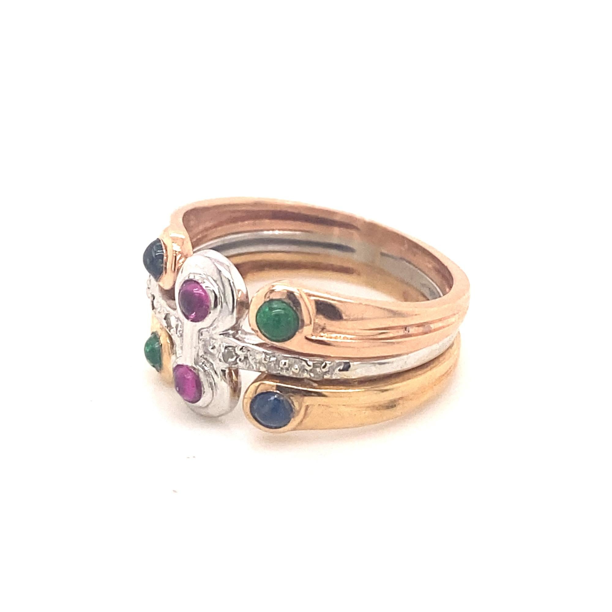 This is a beautiful vintage multi stone ring set with 2 cabochon rubies, emeralds and diamonds.  There are 6 diamonds set win white gold. The ring is marked 585 with a makers mark.  The stones are all natural with nice color and clarity.  The ring