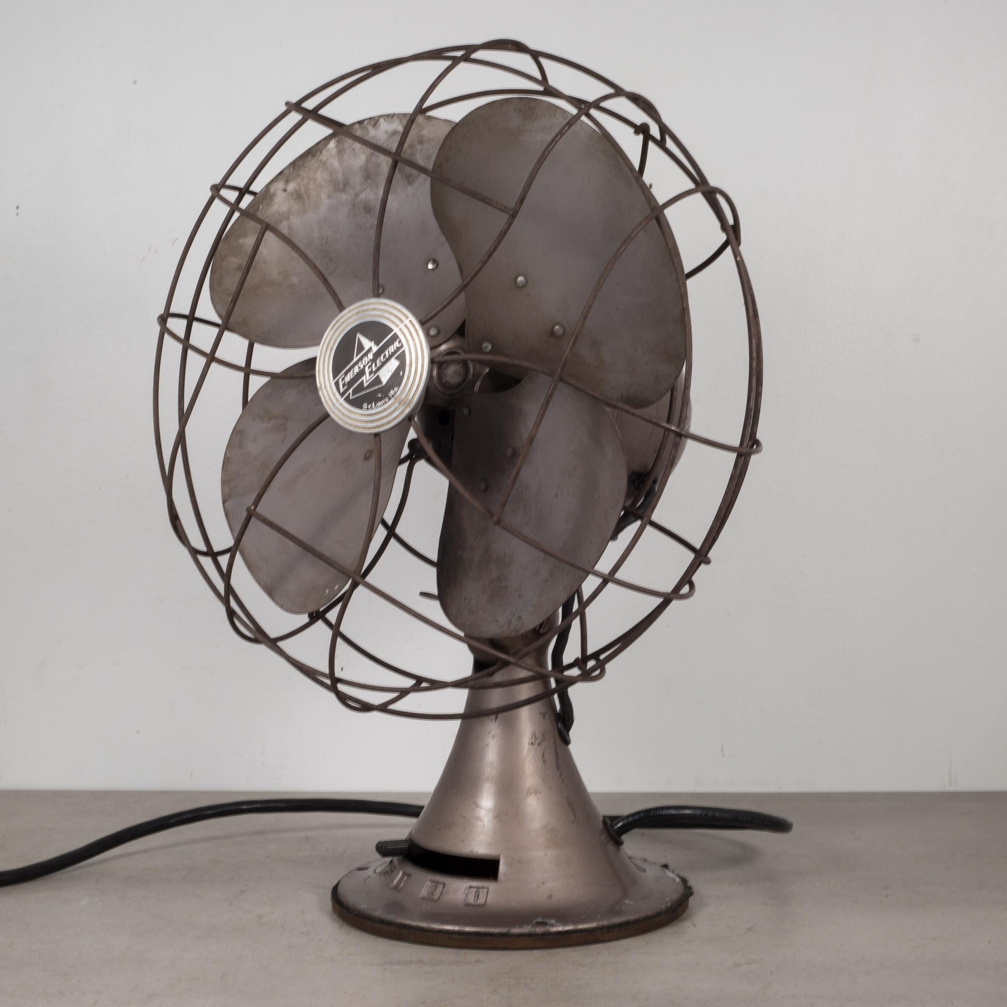 About

A steel and metal oscillating fan with tilting head, three power settings, original label and built in handle. The wiring is good and the fan is in working condition with quiet but powerful settings.

 Creator: Emerson Electric.
 Date of