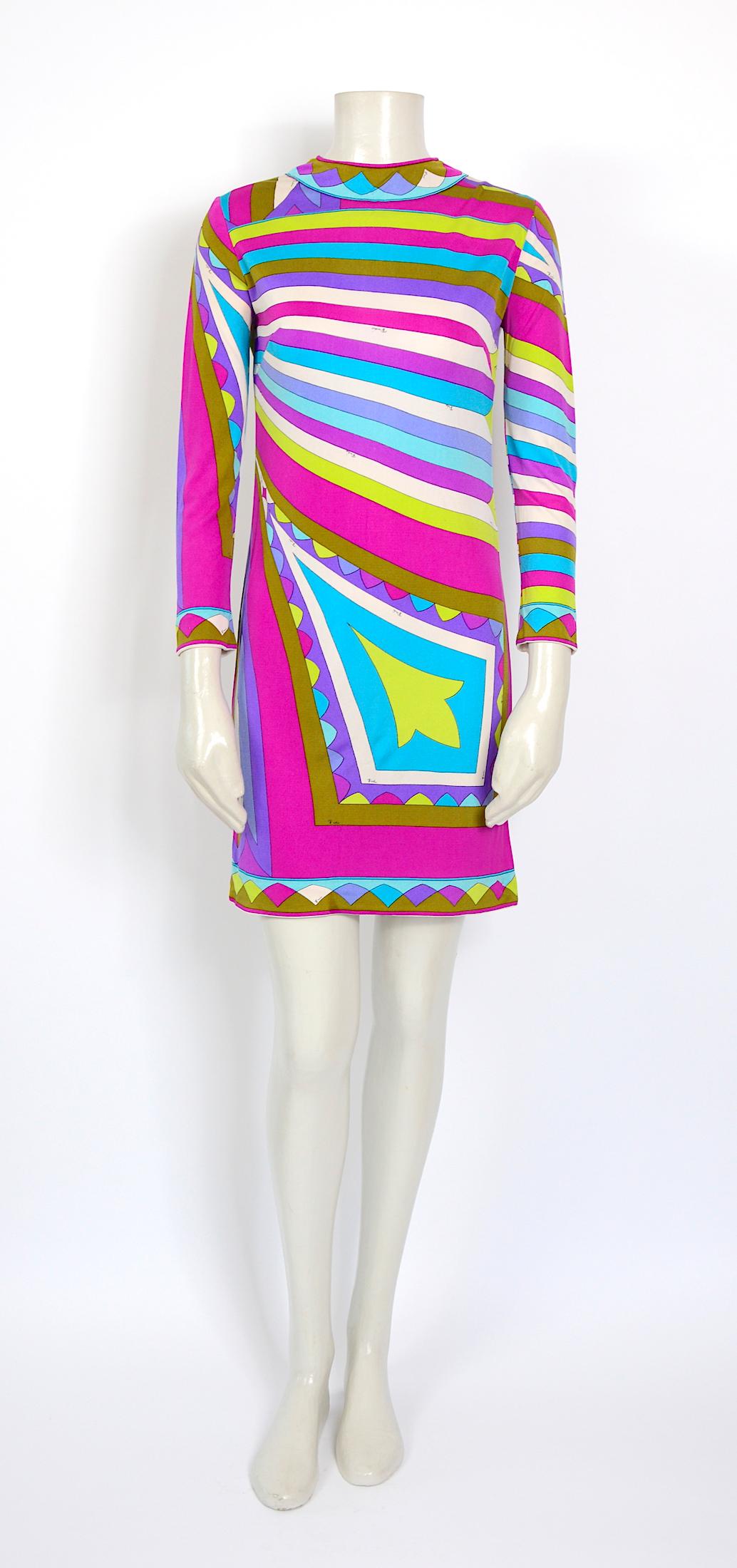 Gorgeous colorful signed silk jersey dress by Emilio Pucci.
Measurements are taken flat:
Sh to Sh 15inch/38cm - Ua to Ua -18inch/46cm(x2) - Waist 16inch/40,5cm(x2) - Hips 17inch/43cm(x2) - TL 33inch/84cm - Sl 20inch/51cm