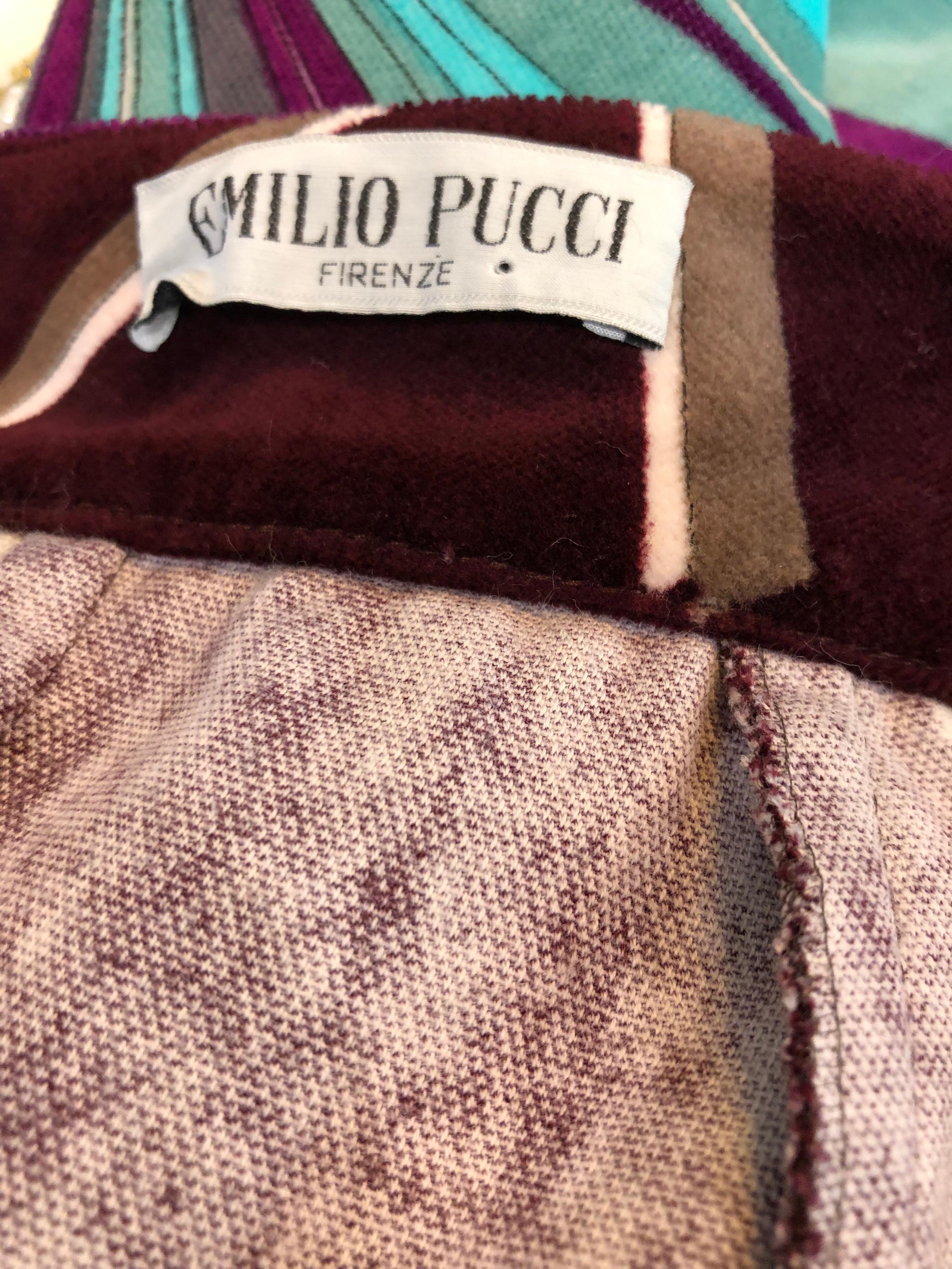 Signature early 90s EMILIO PUCCI vintage high waisted velvet pencil skirt! Features vibrant colors of purple, burgundy, blue, turquoise and brown throughout. Pucci logo signature throughout. Super soft cotton velvet, with a slight stretch. Hidden