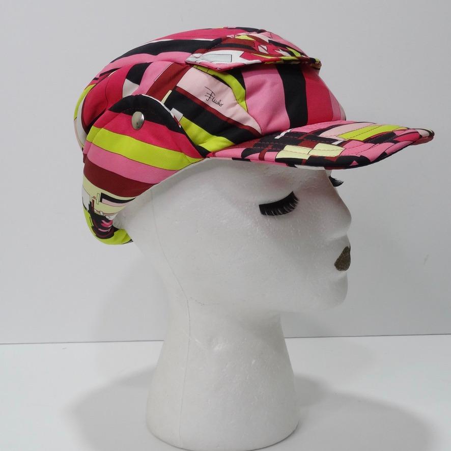 Your search for your next favorite hat ends here! This amazing vintage Emilio Pucci hat has so many fun details, you will never get tired of wearing this. In a classic Pucci pattern printed on silk in vibrant pinks, black, white, and lime green,